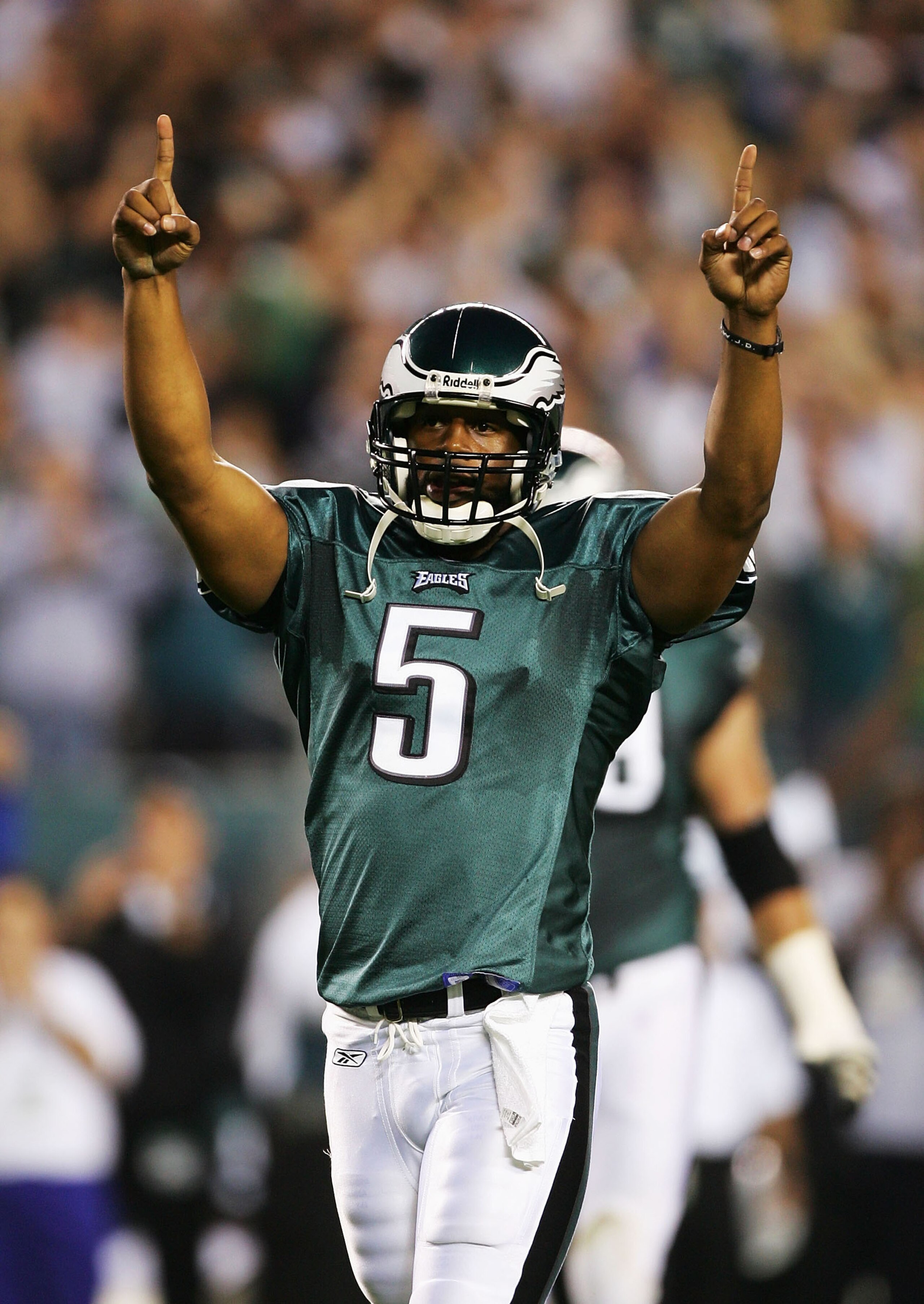 PHILADELPHIA - SEPTEMBER 20:  Donavan McNabb #5  of the Philadelphia Eagles celebrates after he threw a touchdown pass to L.J. Smith #82 to give the Eagles the lead 6-3 (before the point after attempt) over the Minnesota Vikings at Lincoln Financial Field