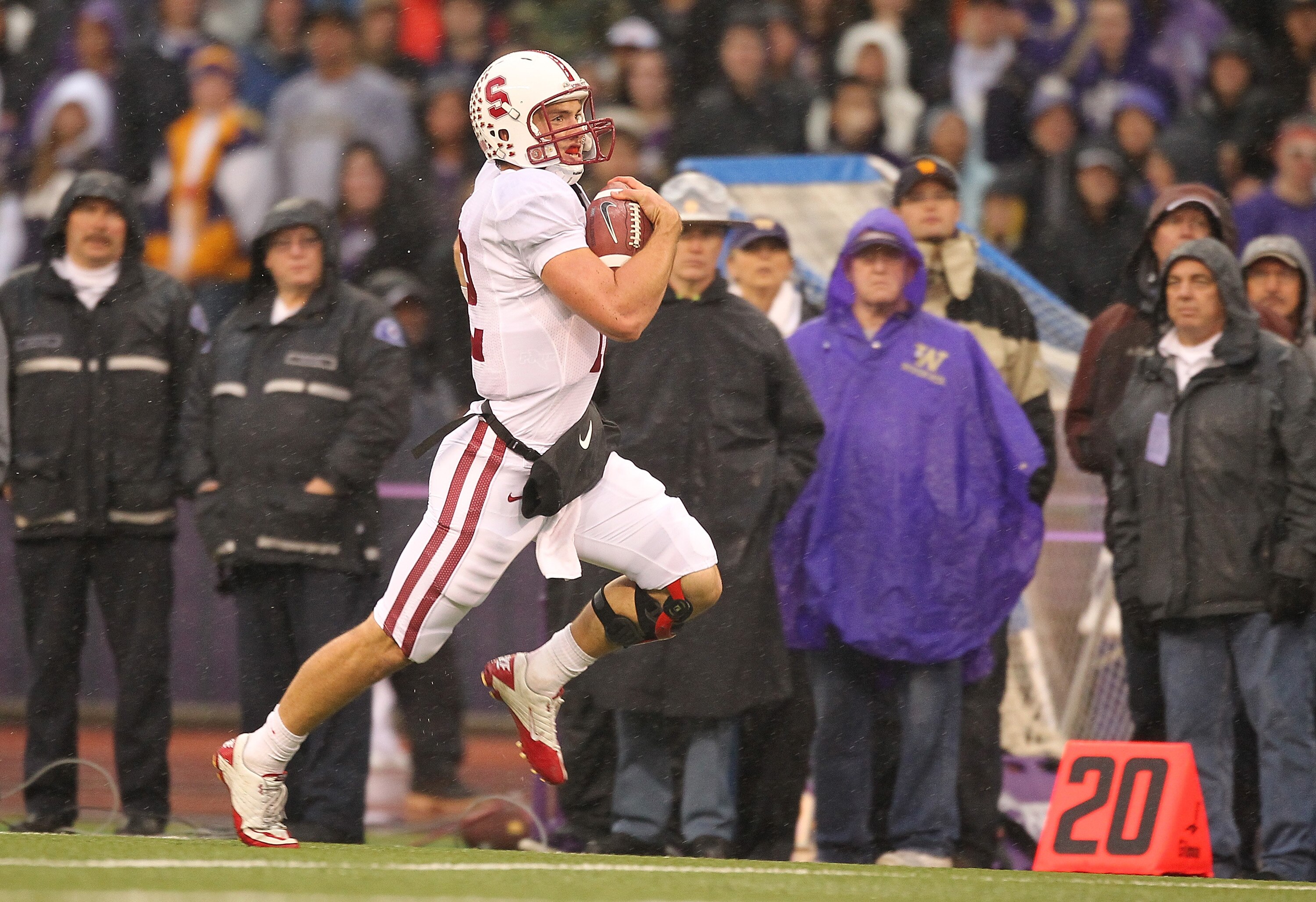 SEATTLE - OCTOBER 30:  Quarterback Andrew Luck #12 of the Stanford Cardinal rushes for a 51 yard touchdown in the first quarter against the Washington Huskies on October 30, 2010 at Husky Stadium in Seattle, Washington. Stanford defeated Washington 41-0.(