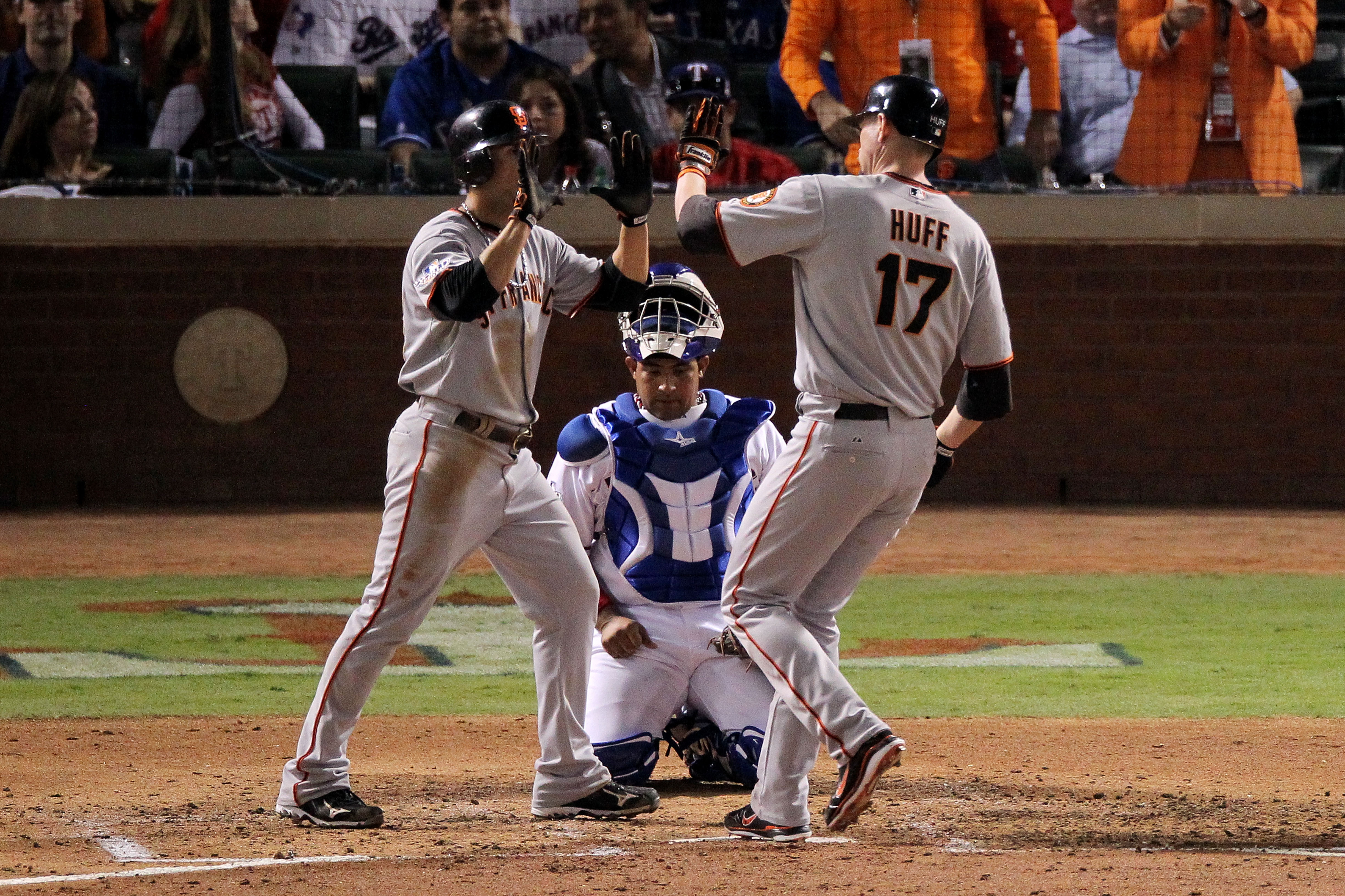 ARLINGTON, TX - OCTOBER 31:  Aubrey Huff #17 of the San Francisco Giants celebrates his 2-run home run with teammate Andres Torres #56 while playing against the Texas Rangers in the top of the third inning of Game Four of the 2010 MLB World Series at Rang
