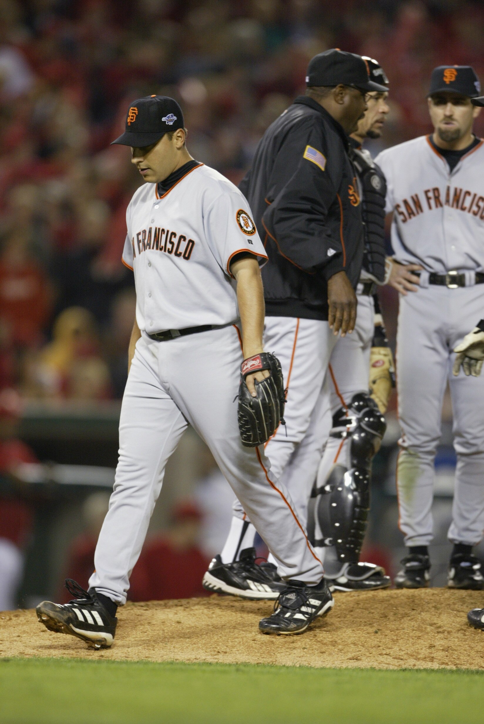 ANAHEIM, CA - OCTOBER 26:  Starting pitcher Russ Ortiz #48 of the San Francisco Giants is pulled by manager Dusty Baker in the fifth inning of game six of the World Series on October 26, 2002 at Edison Field in Anaheim, California. The Angels went on to w