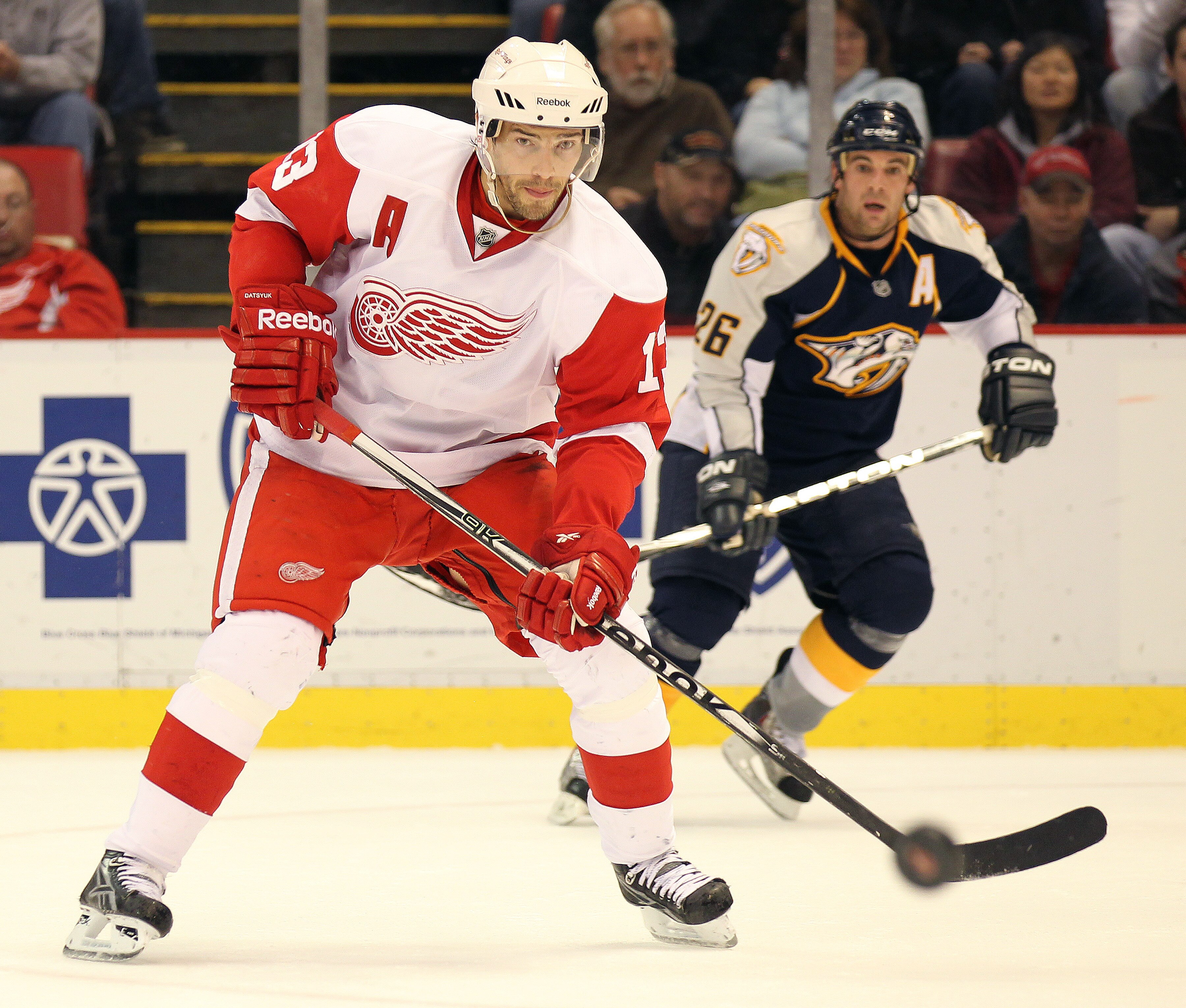 DETROIT - OCTOBER 30:  Pavel Datsyuk #13 of the Detroit Red Wings waits for a puck to come to him in a game against the Nashville Predators on October 30, 2010 at the Joe Louis Arena in Detroit , Michigan. The Wings defeated the Predators 5-2. (Photo by C