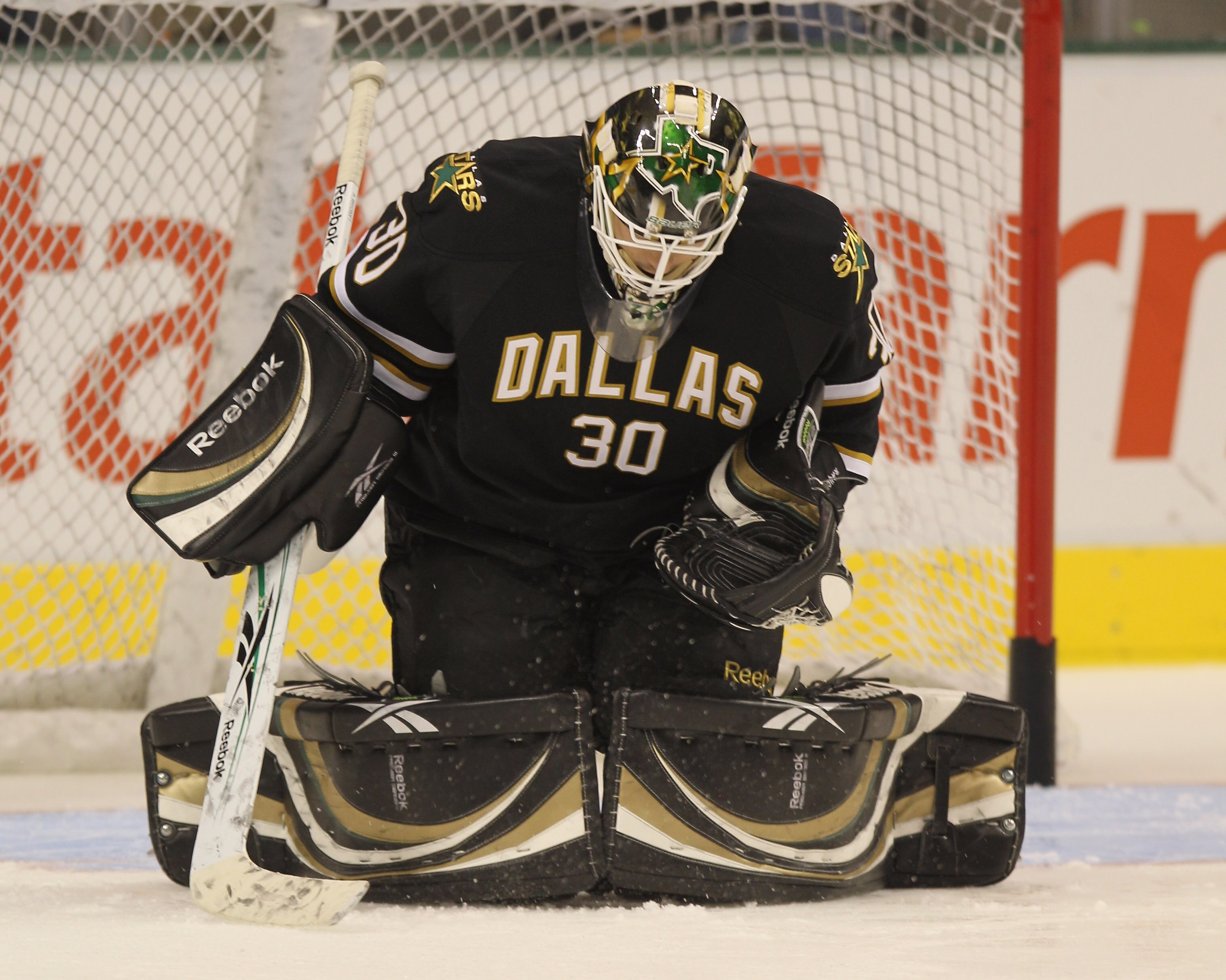 DALLAS - OCTOBER 26:  Andrew Raycroft #30 of the Dallas Stars skates in warmups prior to the Ducks game against the Anaheim Ducks at the American Airlines Center on October 26, 2010 in Dallas, Texas. The Ducks defeated the Stars 5-2.  (Photo by Bruce Benn