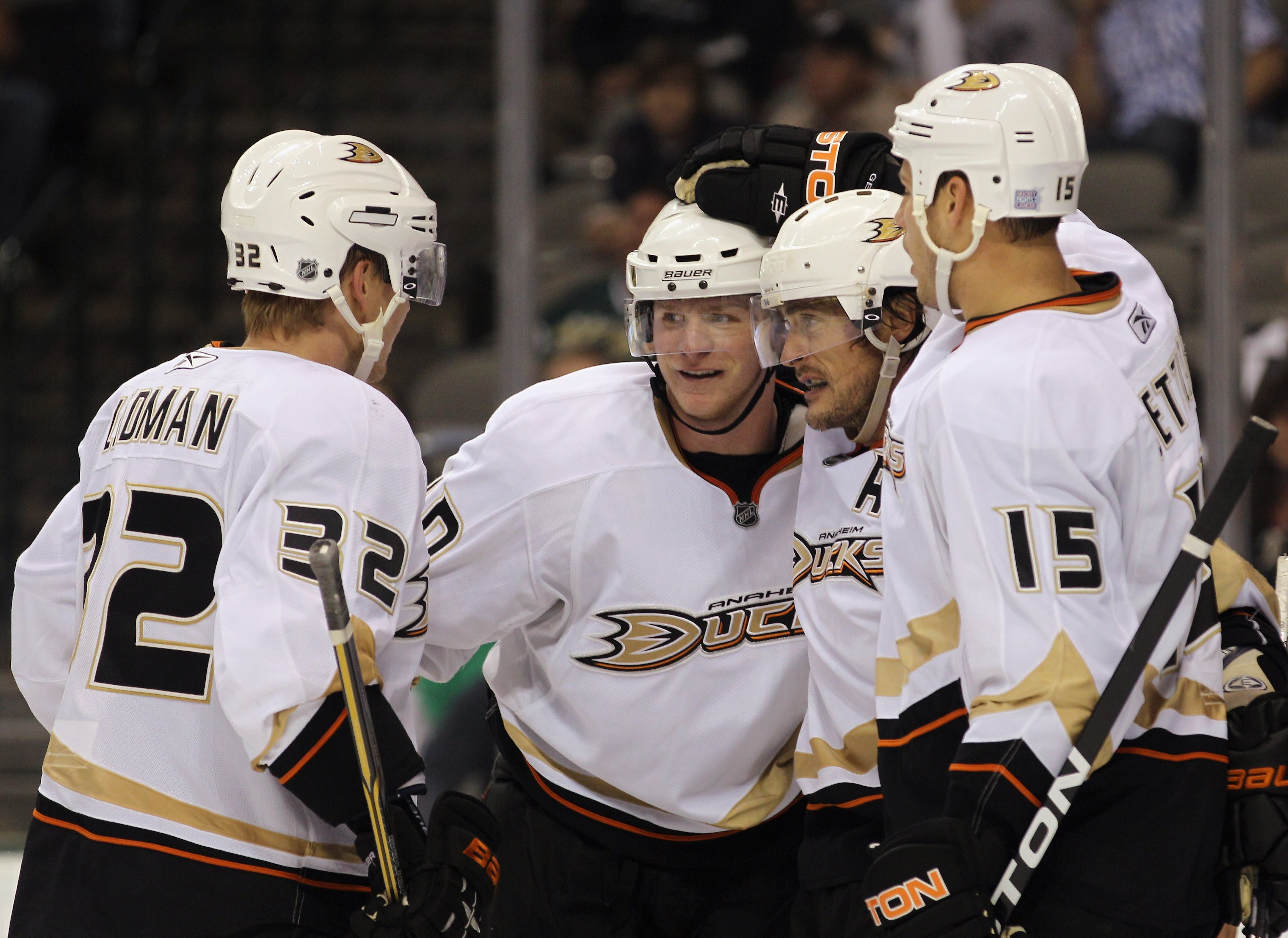 DALLAS - OCTOBER 26: (L-R) Toni Lydman #32, Corey Perry #10, Teemu Selanne #8 and Ryan Getzlaf #15 of the Anaheim Ducks celebrate Selanne's third period goal against the Dallas Stars at the American Airlines Center on October 26, 2010 in Dallas, Texas. Th