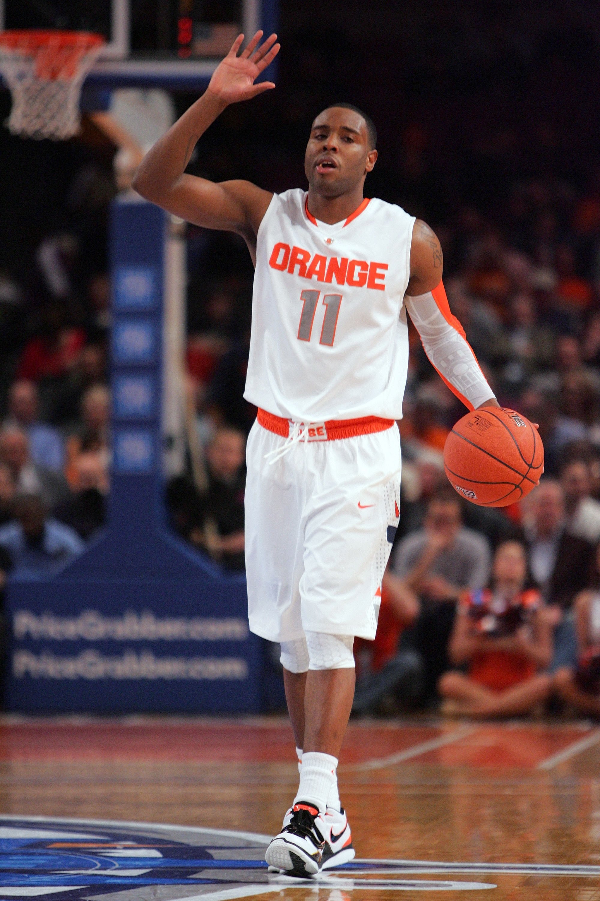 NEW YORK - MARCH 11:  Scoop Jardine #11 of the Syracuse Orange handles the ball during the quarterfinal of the 2010 NCAA Big East Tournament at Madison Square Garden on March 11, 2010 in New York City.  (Photo by Chris Trotman/Getty Images)