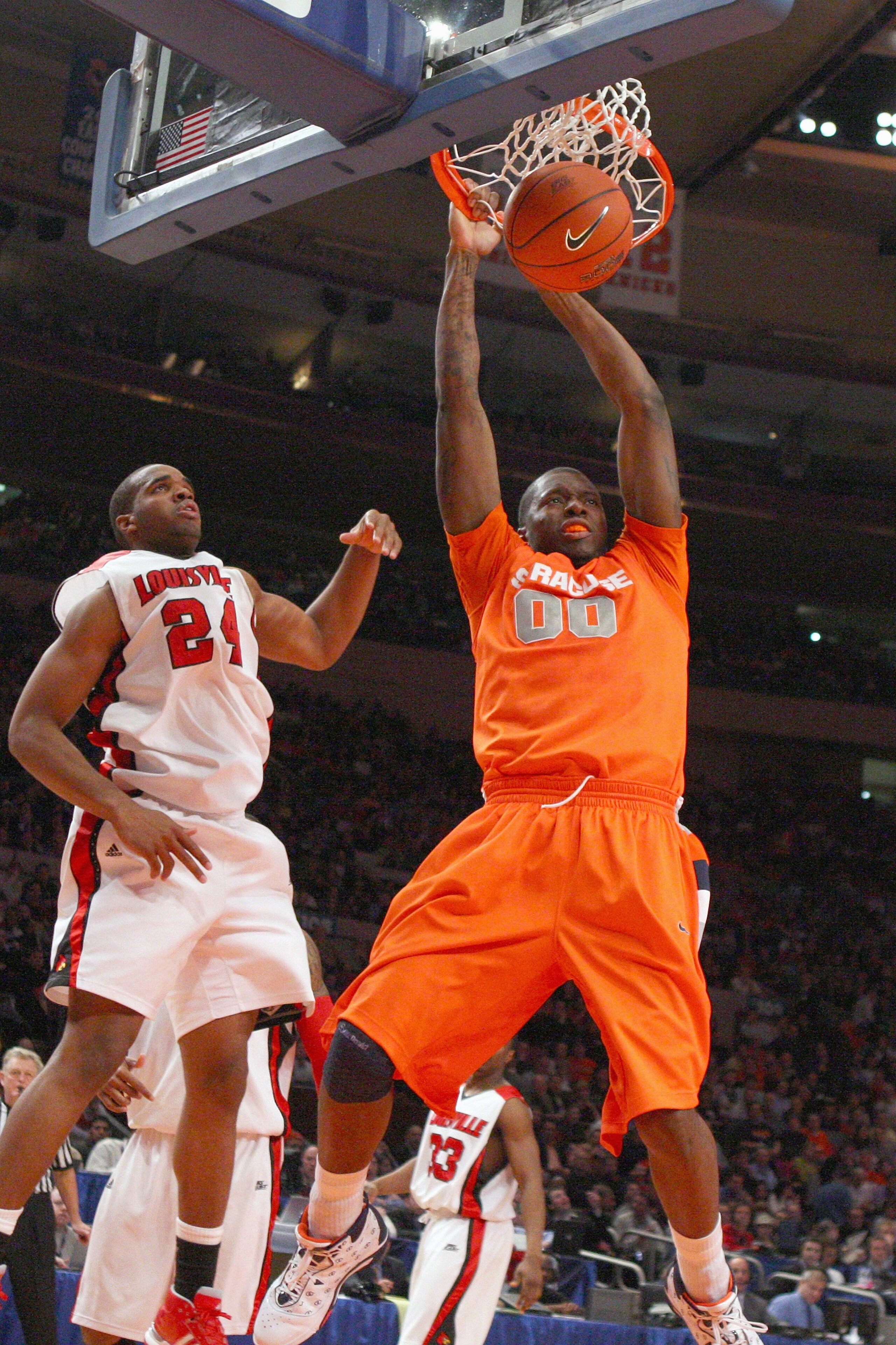 NEW YORK - MARCH 14:  Rick Jackson #00 of the Syracuse Orange dunks the ball against the Louisville Cardinals during the championship game of the Big East Tournament at Madison Square Garden on March 14, 2009 in New York City.  (Photo by Jim McIsaac/Getty