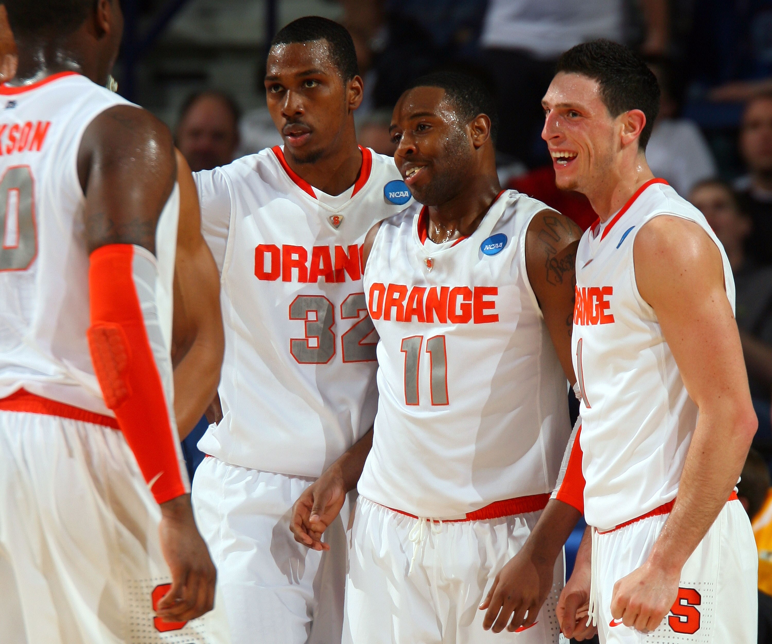 BUFFALO, NY - MARCH 19:  Rick Jackson #0, Kris Joseph #32, Scoop Jardine #11 and  Andy Rautins #1 of the Syracuse Orange react after a play against the Vermont Catamounts during the first round of the 2010 NCAA men's basketball tournament at HSBC Arena on