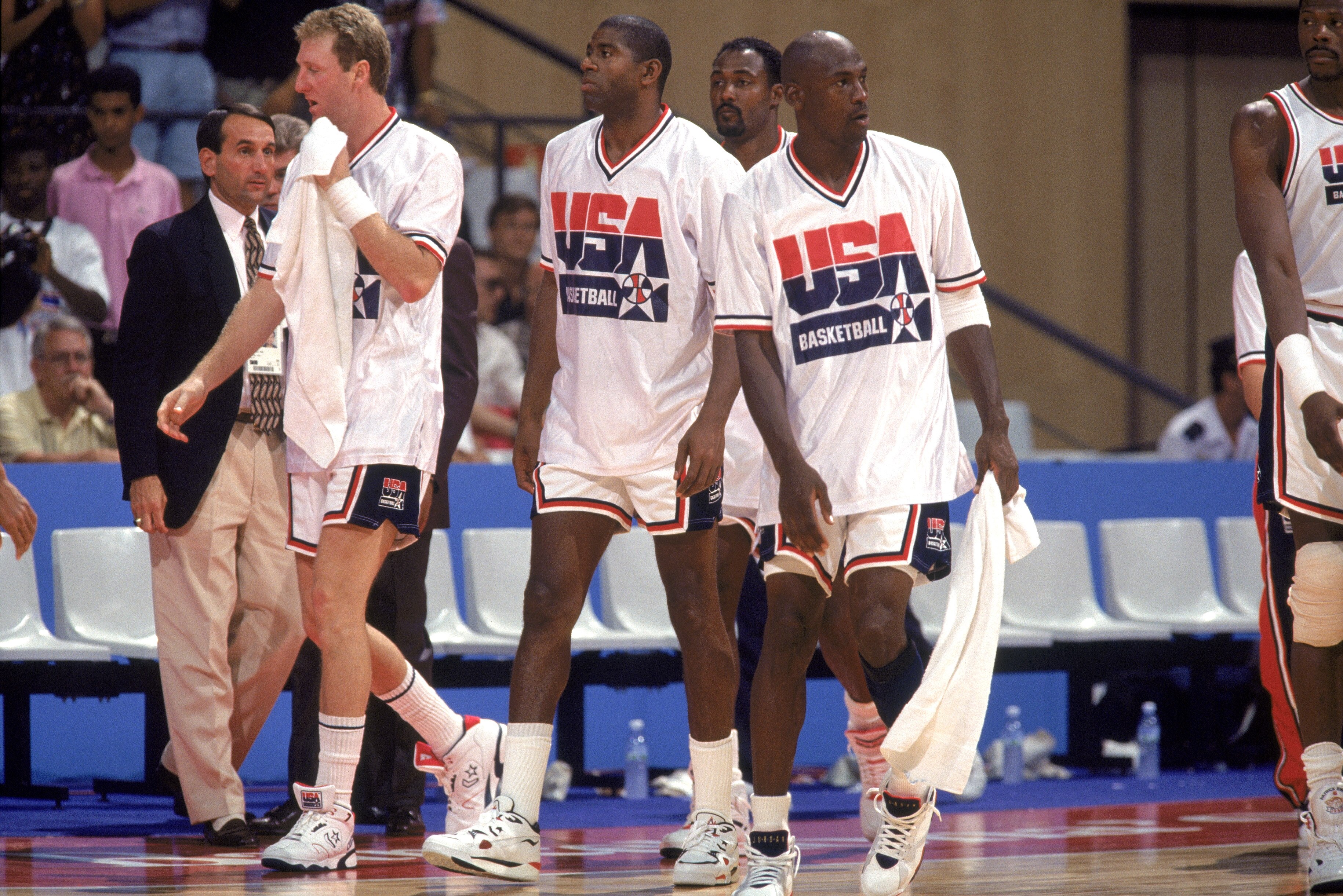 BARCELONA, ESP - JULY 26: (L-R) Larry Bird, Earvin (Magic) Johnson, Michael Jordan and Karl Malone of the USA Olympic Basketball Team (The Dream Team) walk on the court during a game against The Republic of Angola Olympic Team on July 26,1992 in Barcelona