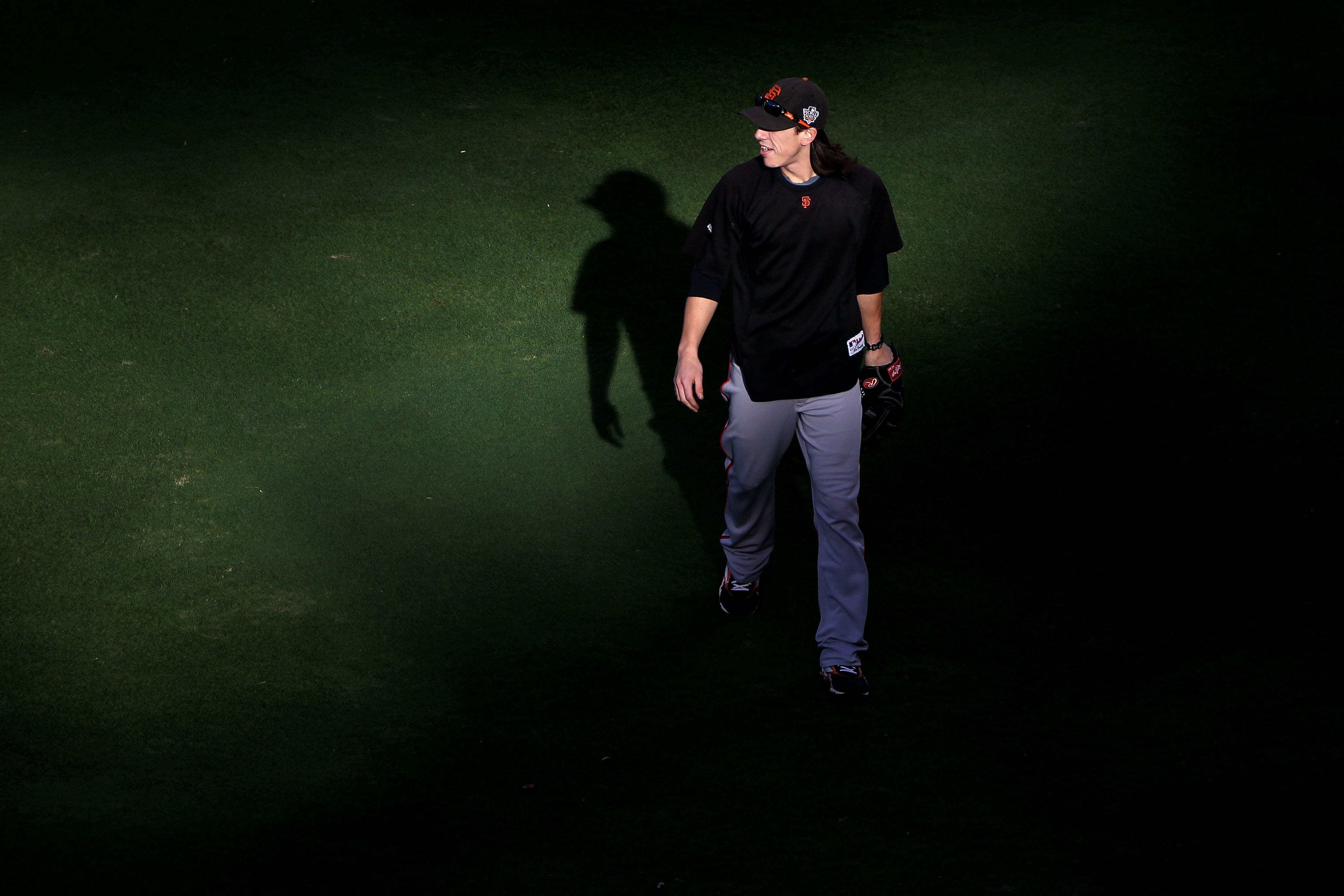 ARLINGTON, TX - OCTOBER 30:  Tim Lincecum #55 of the San Francisco Giants looks on during batting practce against the Texas Rangers in Game Three of the 2010 MLB World Series at Rangers Ballpark in Arlington on October 30, 2010 in Arlington, Texas.  (Phot