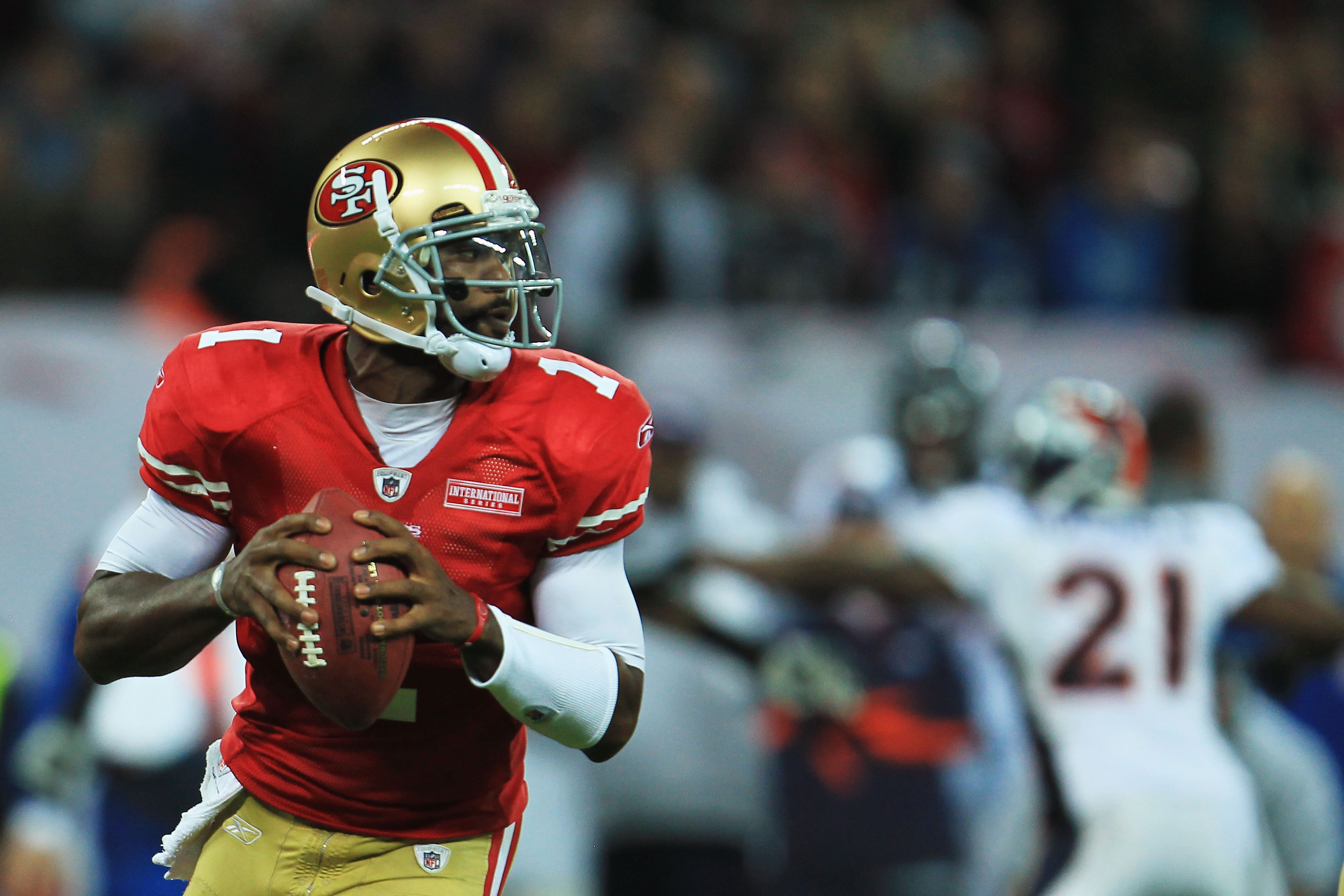 LONDON, ENGLAND - OCTOBER 31:  Troy Smith #1 of San Francisco 49ers looks for a pass during the NFL International Series match between Denver Broncos and San Francisco 49ers at Wembley Stadium on October 31, 2010 in London, England. This is the fourth occ