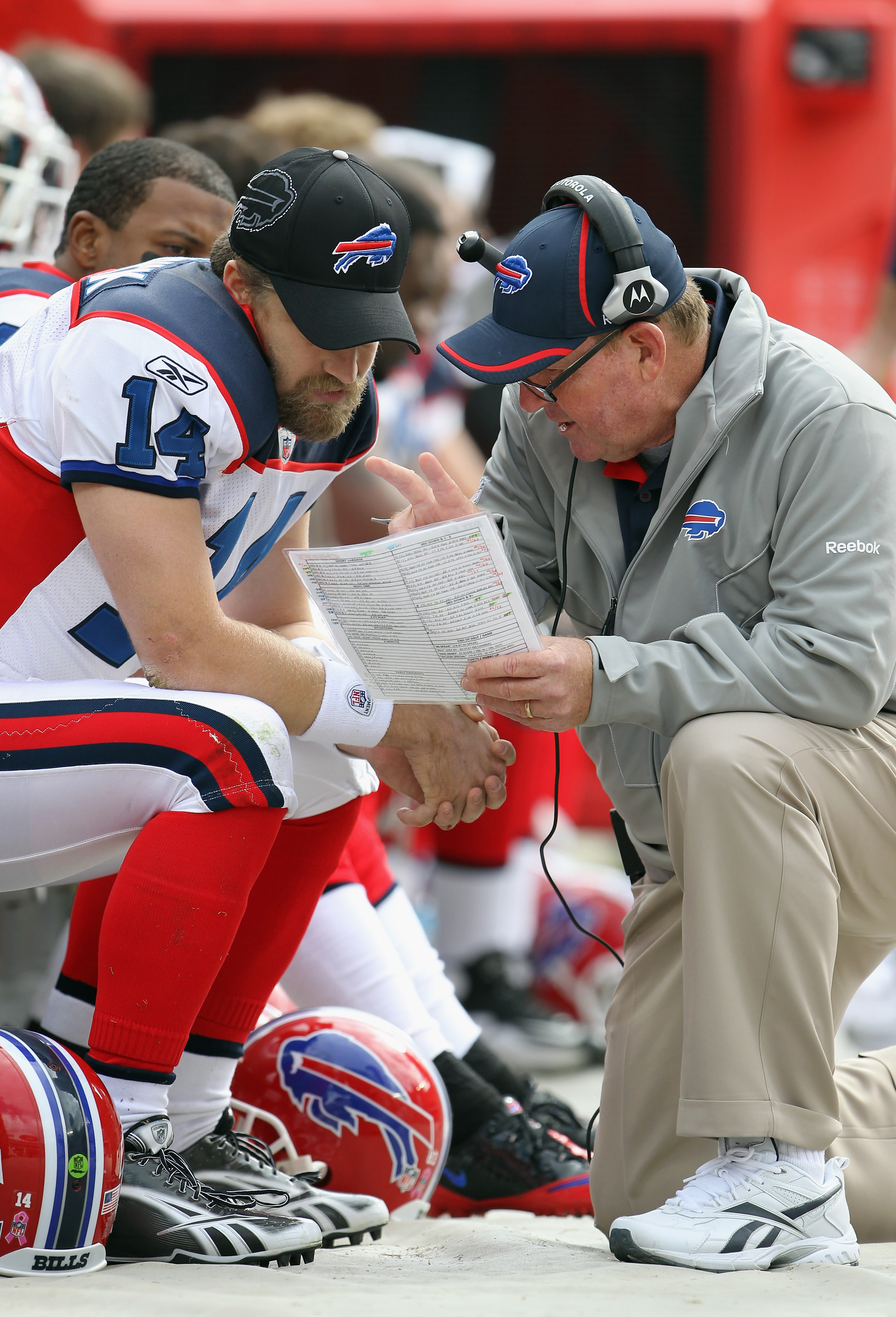 KANSAS CITY, MO - OCTOBER 31:  Head coach Chan Gailey of the Buffalo Bills talks on the sidelines with quarterback Ryan Fitzpatrick #14  during the game against the Kansas City Chiefs on October 31, 2010  at Arrowhead Stadium in Kansas City, Missouri.  (P