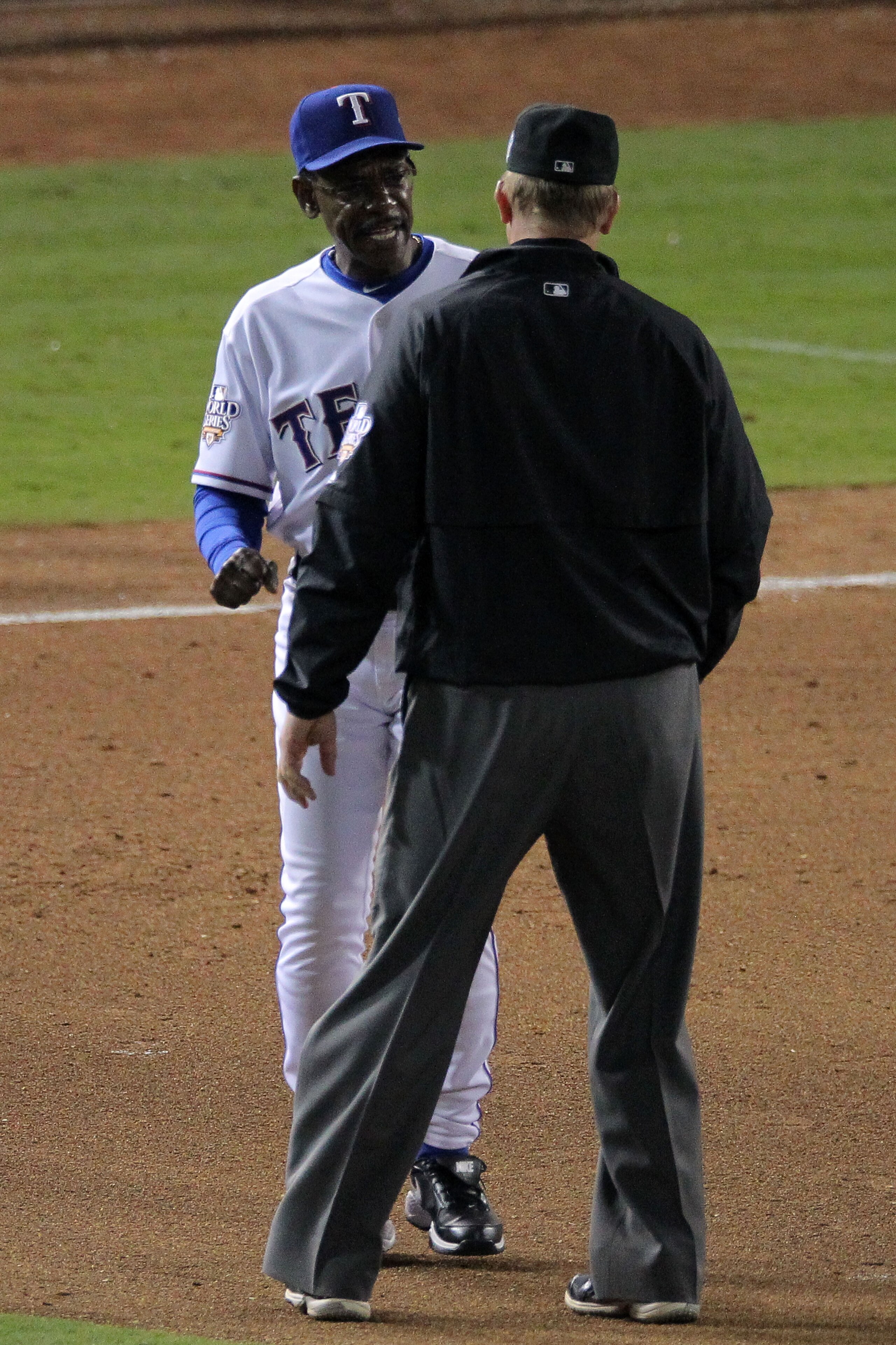 ARLINGTON, TX - OCTOBER 31: Manager Ron Washington #38 of the Texas Rangers contests a call with the first base umpire who called the second out of the double play in the bottom of the sixth inning against the San Francisco Giants in Game Four of the 2010