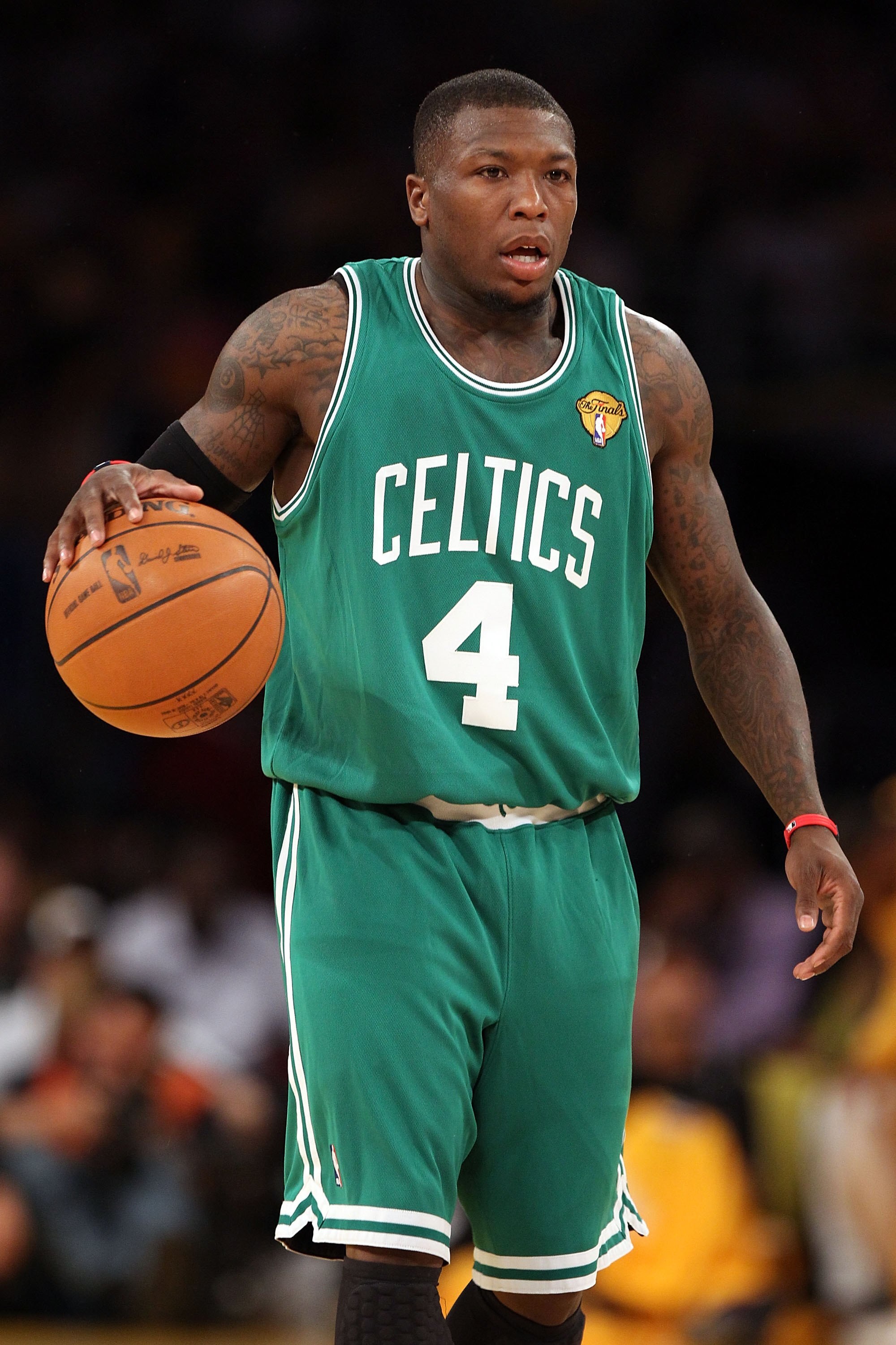 LOS ANGELES, CA - JUNE 15:  Nate Robinson #4 of the Boston Celtics moves the ball while taking on the Los Angeles Lakers in Game Six of the 2010 NBA Finals at Staples Center on June 15, 2010 in Los Angeles, California.  NOTE TO USER: User expressly acknow