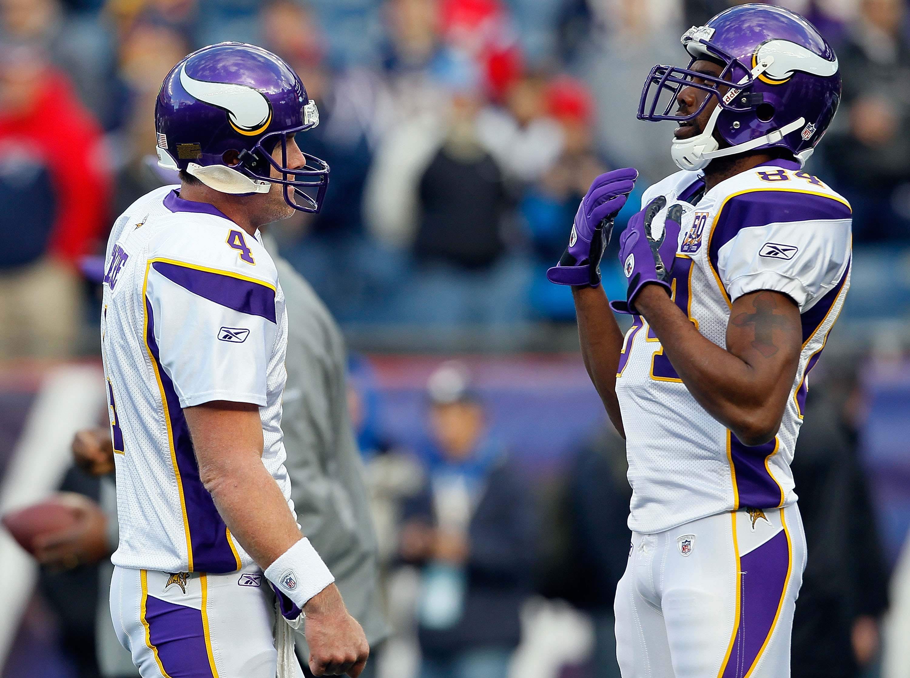 FOXBORO, MA - OCTOBER 31:  Brett Favre #4 of the Minnesota Vikings interacts with teammate Randy Moss #84 before a game against the New England Patriots at Gillette Stadium on October 31, 2010 in Foxboro, Massachusetts. (Photo by Jim Rogash/Getty Images)