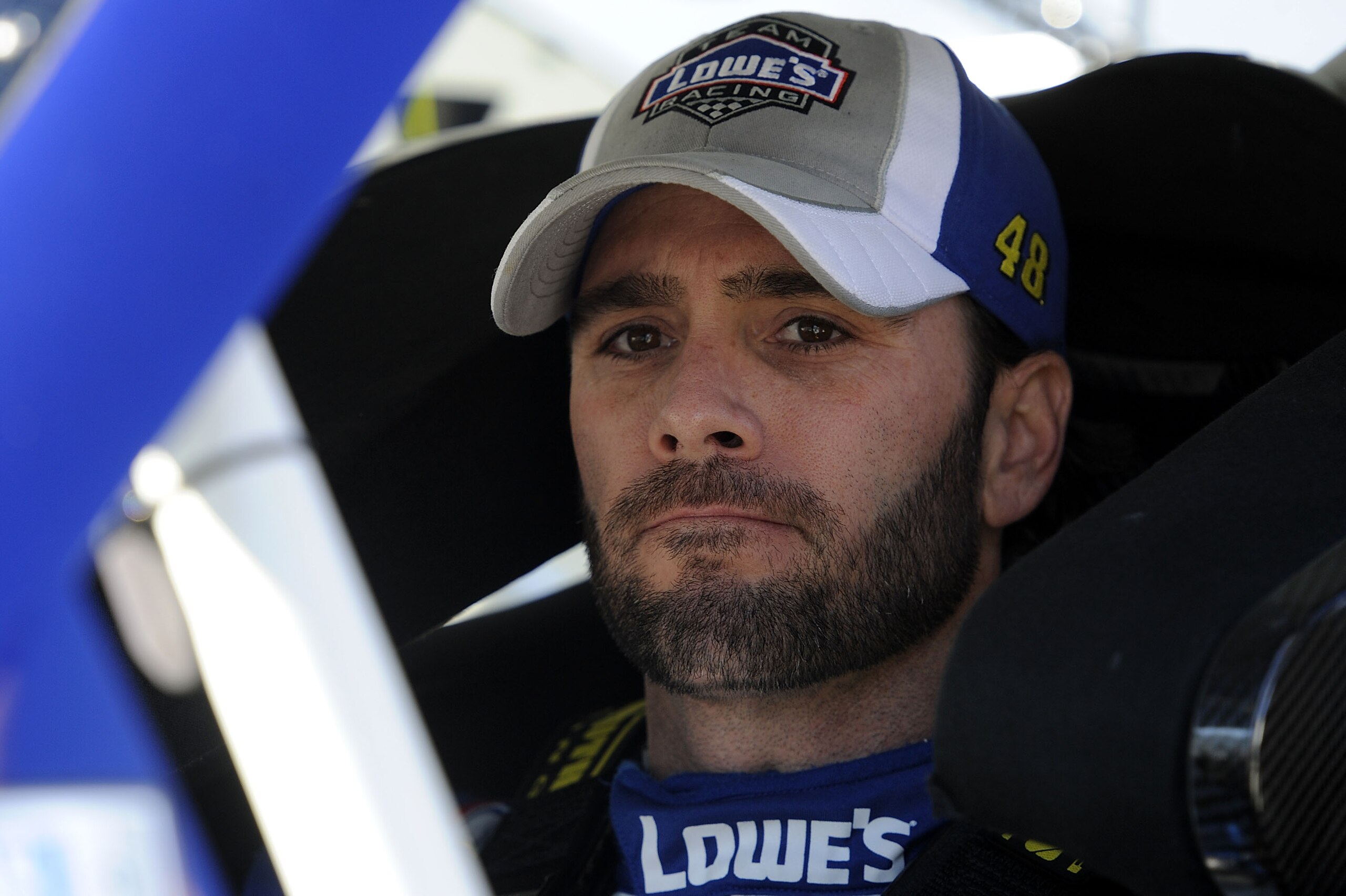 MARTINSVILLE, VA - OCTOBER 22:  Jimmie Johnson, driver of the #48 Lowe's Chevrolet, sits in his car on pit road during qualifying for the NASCAR Sprint Cup Series TUMS Fast Relief 500 at Martinsville Speedway on October 22, 2010 in Martinsville, Virginia.