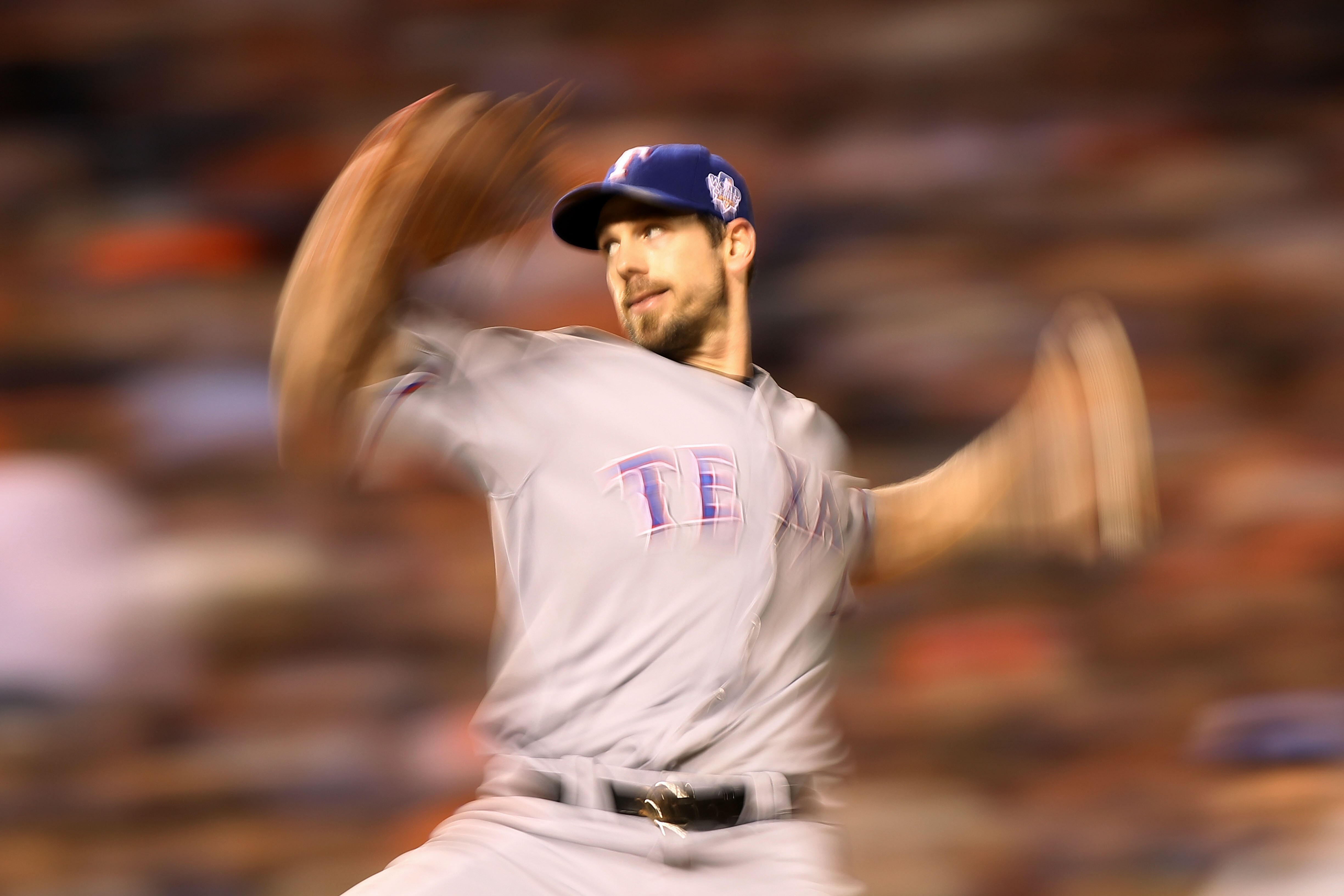 SAN FRANCISCO - OCTOBER 27:  Cliff Lee #33 of the Texas Rangers pitches against the San Francisco Giants in Game One of the 2010 MLB World Series at AT&T Park on October 27, 2010 in San Francisco, California.  (Photo by Jed Jacobsohn/Getty Images)