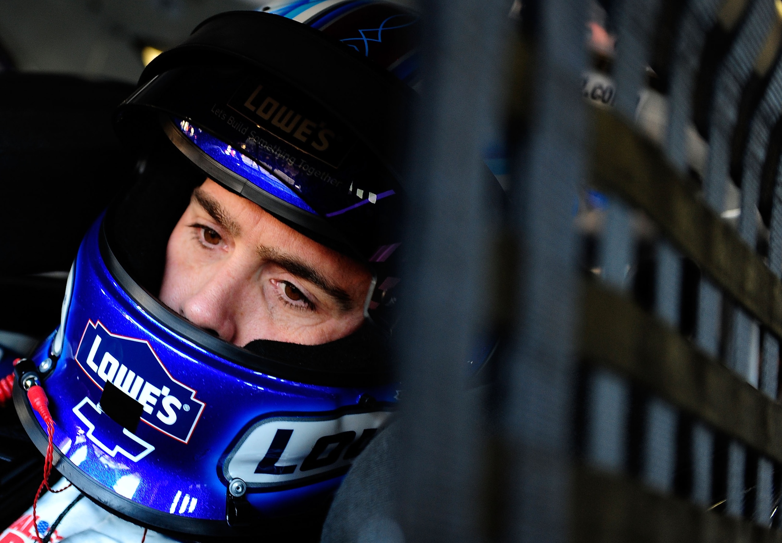 TALLADEGA, AL - OCTOBER 29:  Jimmie Johnson, driver of the #48 Lowe's Chevrolet, sits in his car during practice for the NASCAR Sprint Cup Series AMP Energy Juice 500 at Talladega Superspeedway on October 29, 2010 in Talladega, Alabama.  (Photo by Rusty J
