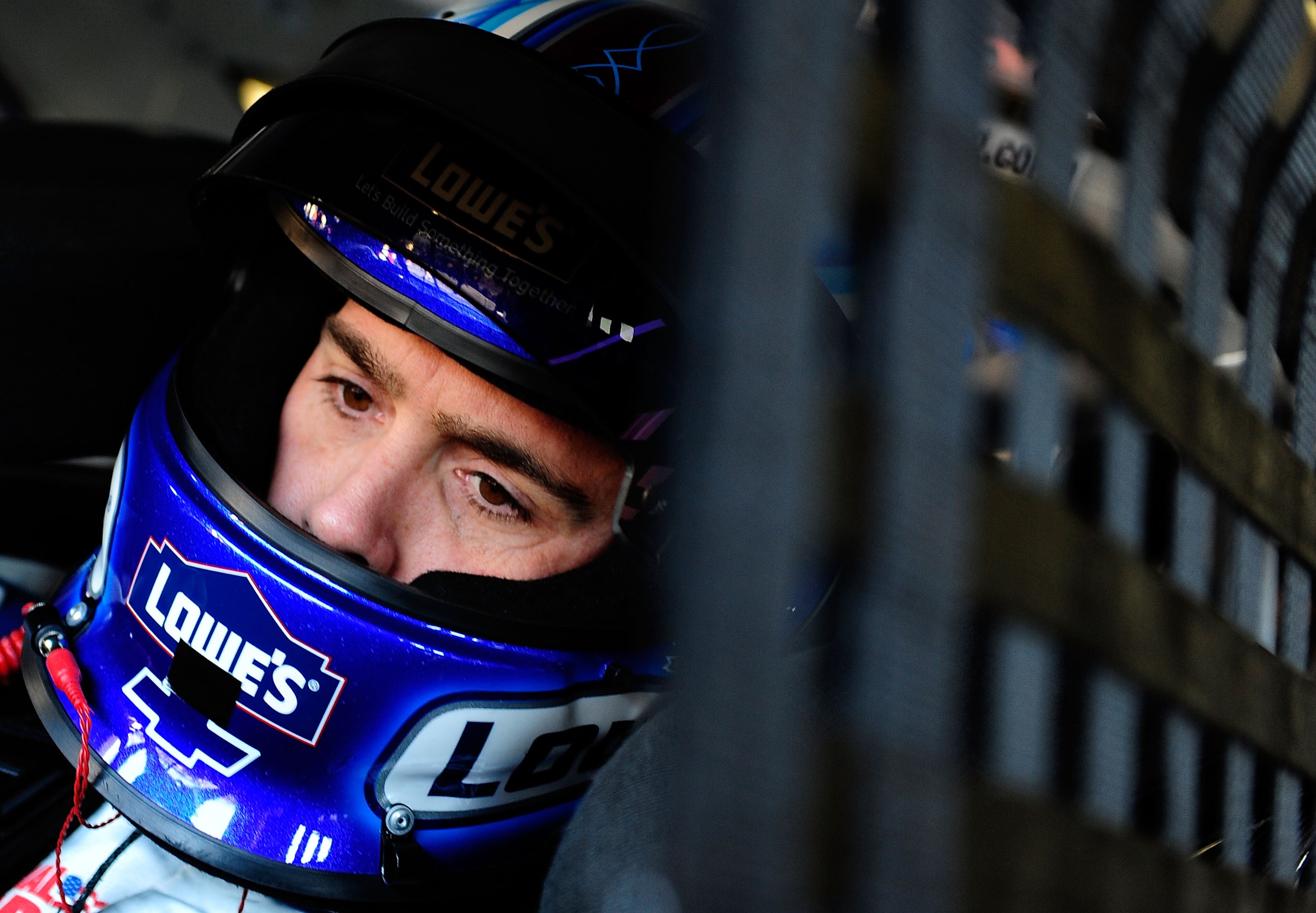 TALLADEGA, AL - OCTOBER 29:  Jimmie Johnson, driver of the #48 Lowe's Chevrolet, sits in his car during practice for the NASCAR Sprint Cup Series AMP Energy Juice 500 at Talladega Superspeedway on October 29, 2010 in Talladega, Alabama.  (Photo by Rusty J