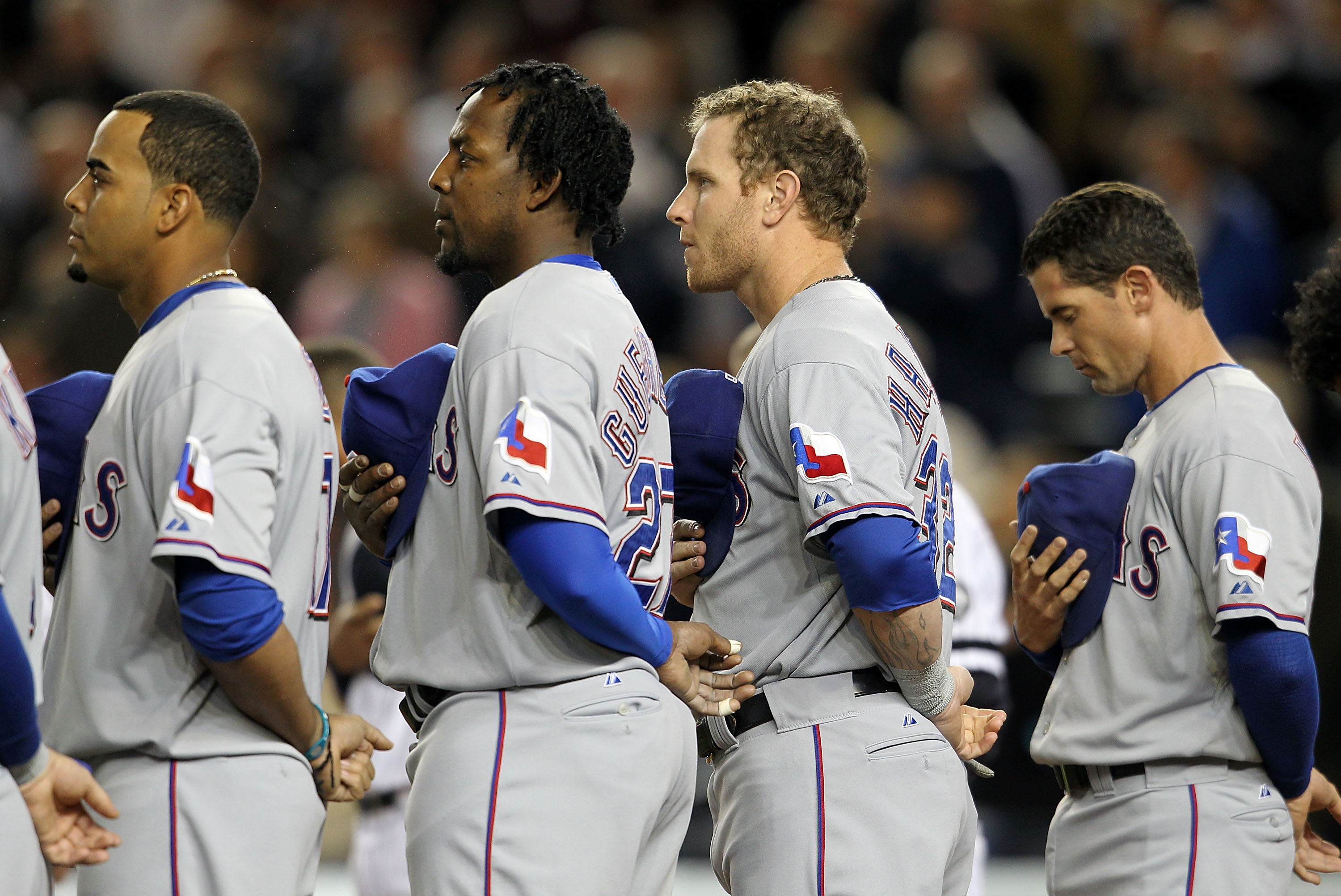 NEW YORK - OCTOBER 18:  Nelson Cruz #17, Vladimir Guerrero #27, Josh Hamilton #32 and Michael Young #10 of the Texas Rangers stand for pregame festivities against the New York Yankees in Game Three of the ALCS during the 2010 MLB Playoffs at Yankee Stadiu