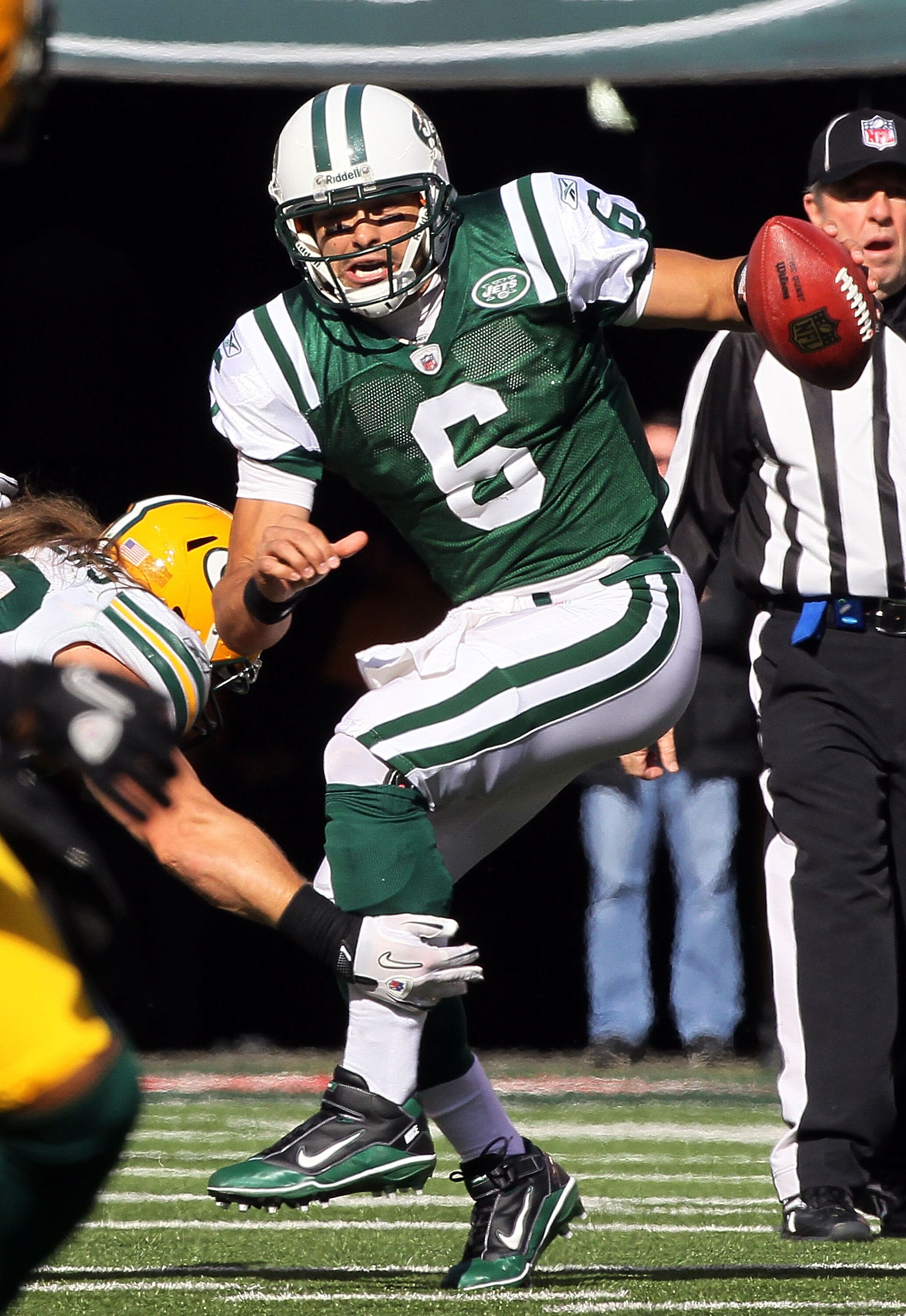 EAST RUTHERFORD, NJ - OCTOBER 31: Mark Sanchez #6 of the New York Jets scrambles against the Green Bay Packers on October 31, 2010 at the New Meadowlands Stadium in East Rutherford, New Jersey. (Photo by Jim McIsaac/Getty Images)
