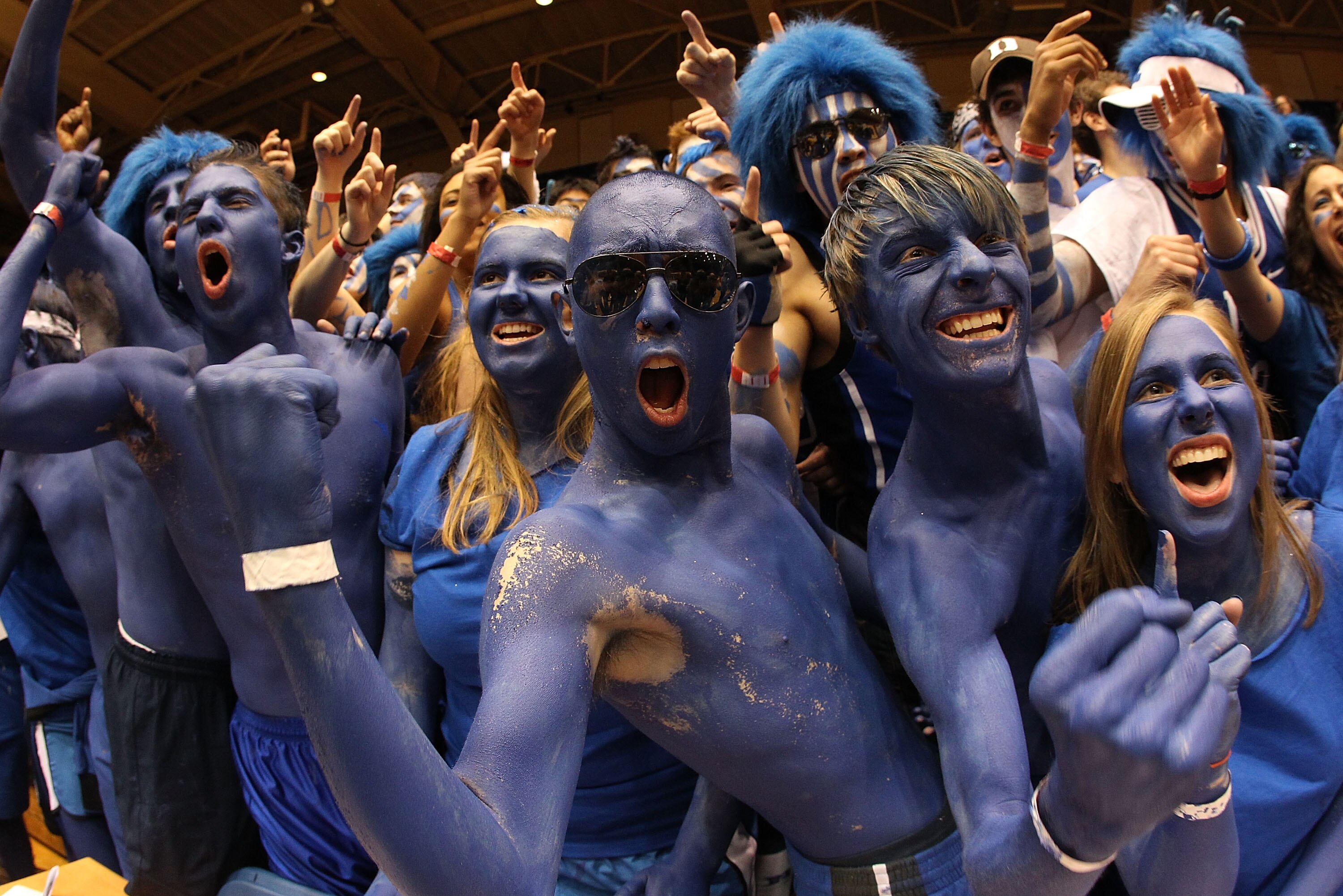 DURHAM, NC - MARCH 06:  Cameron Crazies celebrates before the start of the game between the North Carolina Tar Heels and Duke Blue Devils at Cameron Indoor Stadium on March 6, 2010 in Durham, North Carolina.  (Photo by Streeter Lecka/Getty Images)