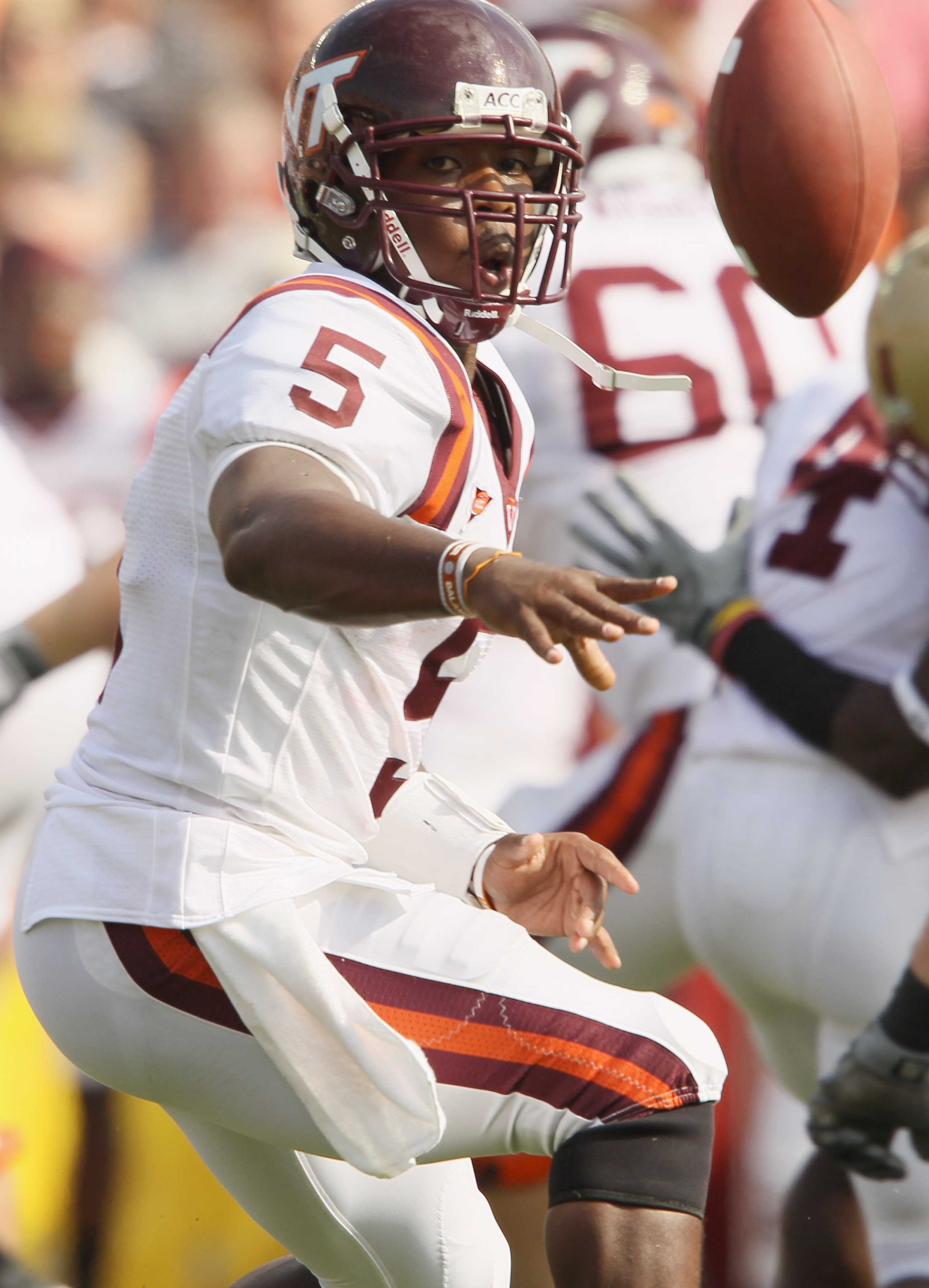 CHESTNUT HILL, MA - SEPTEMBER 25: Tyrod Taylor #5 of the Virginia Tech Hokies flips the ball in the fourth quarter against the Boston College Eagles on September 25, 2010 at Alumni Stadium in Chestnut Hill, Massachusetts. Virginia Tech defeated Boston Co CHESTNUT HILL, MA - SEPTEMBER 25: Tyrod Taylor #5 of the Virginia Tech Hokies flips the ball in the fourth quarter against the Boston College Eagles on September 25, 2010 at Alumni Stadium in Chestnut Hill, Massachusetts. Virginia Tech defeated Boston Co