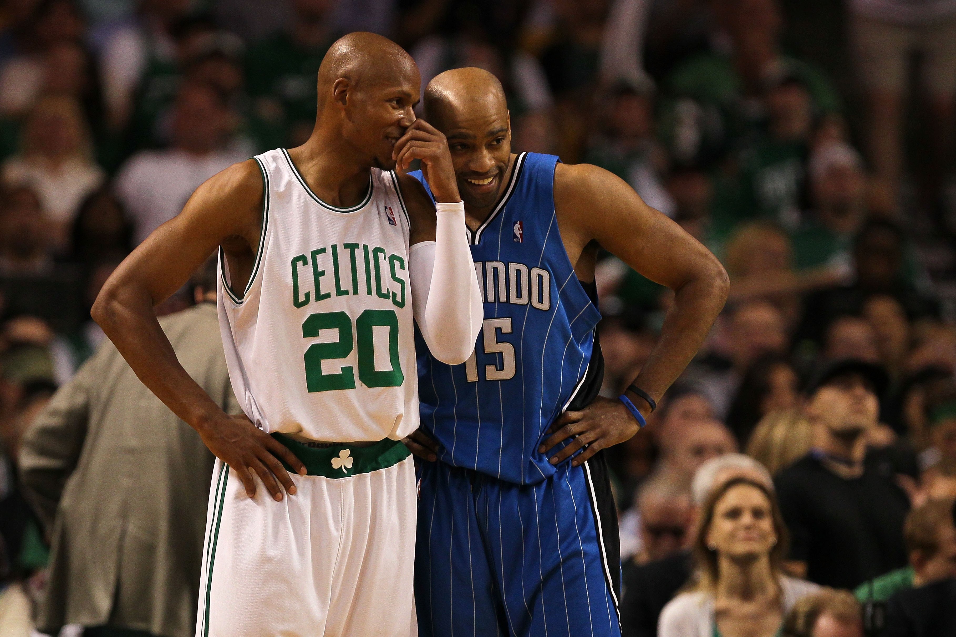 BOSTON - MAY 24:  Ray Allen #20 of the Boston Celtics talks with Vince Carter #15 of the Orlando Magic in Game Four of the Eastern Conference Finals during the 2010 NBA Playoffs at TD Banknorth Garden on May 24, 2010 in Boston, Massachusetts.  NOTE TO USE