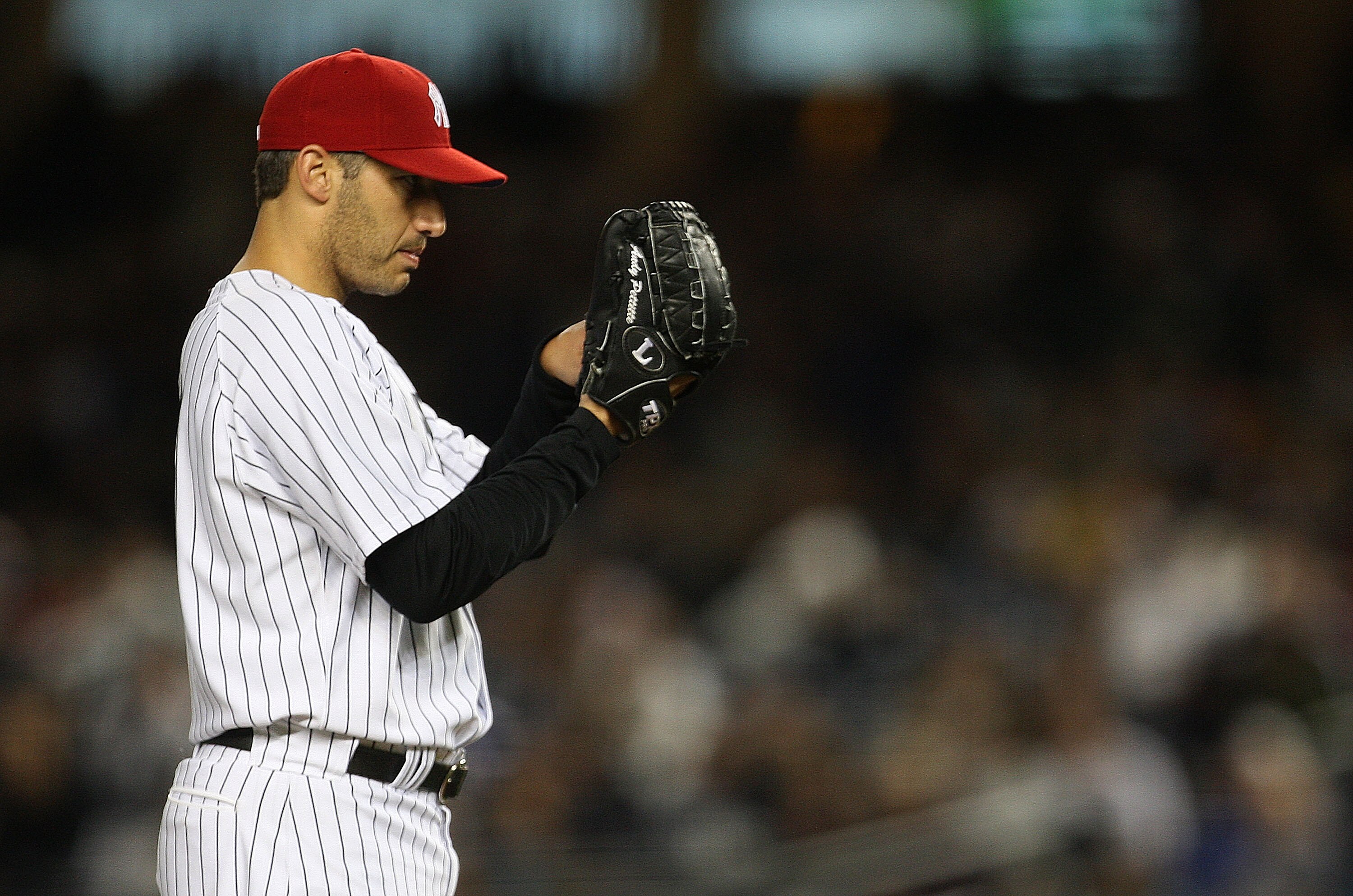 NEW YORK - SEPTEMBER 11:  Pitcher Andy Pettite #46 of the New York Yankees pitches during a game against the Baltimore Orioles at Yankee Stadium on September 11, 2009 in the Bronx borough of New York City.  (Photo by Mike Ehrmann/Getty Images)