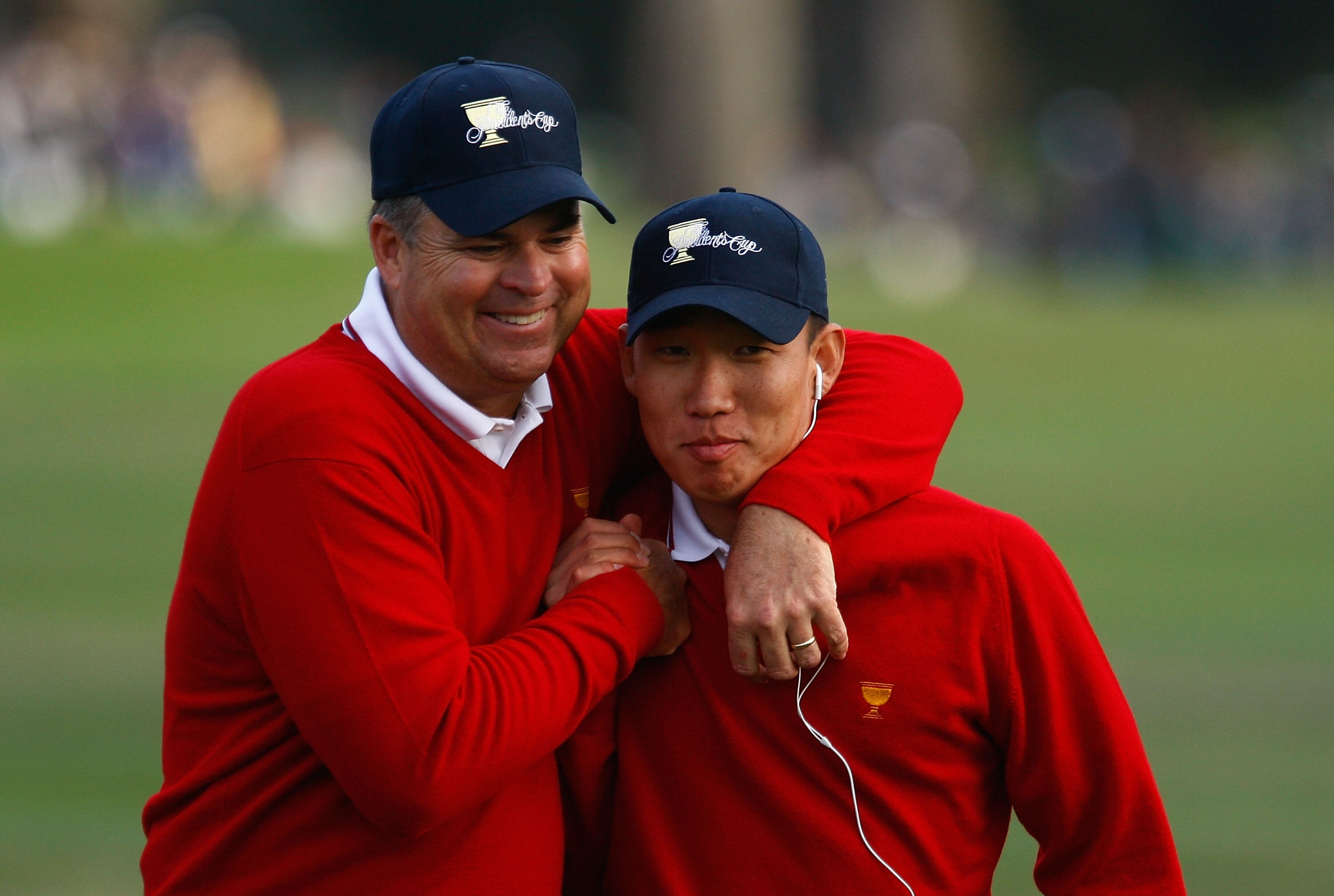SAN FRANCISCO - OCTOBER 08:  (L-R)  Kenny Perry and Anthony Kim of the USA Team celebrate in the 18th fairway during the Day One Foursome Matches of The Presidents Cup at Harding Park Golf Course on October 8, 2009 in San Francisco, California.  (Photo by