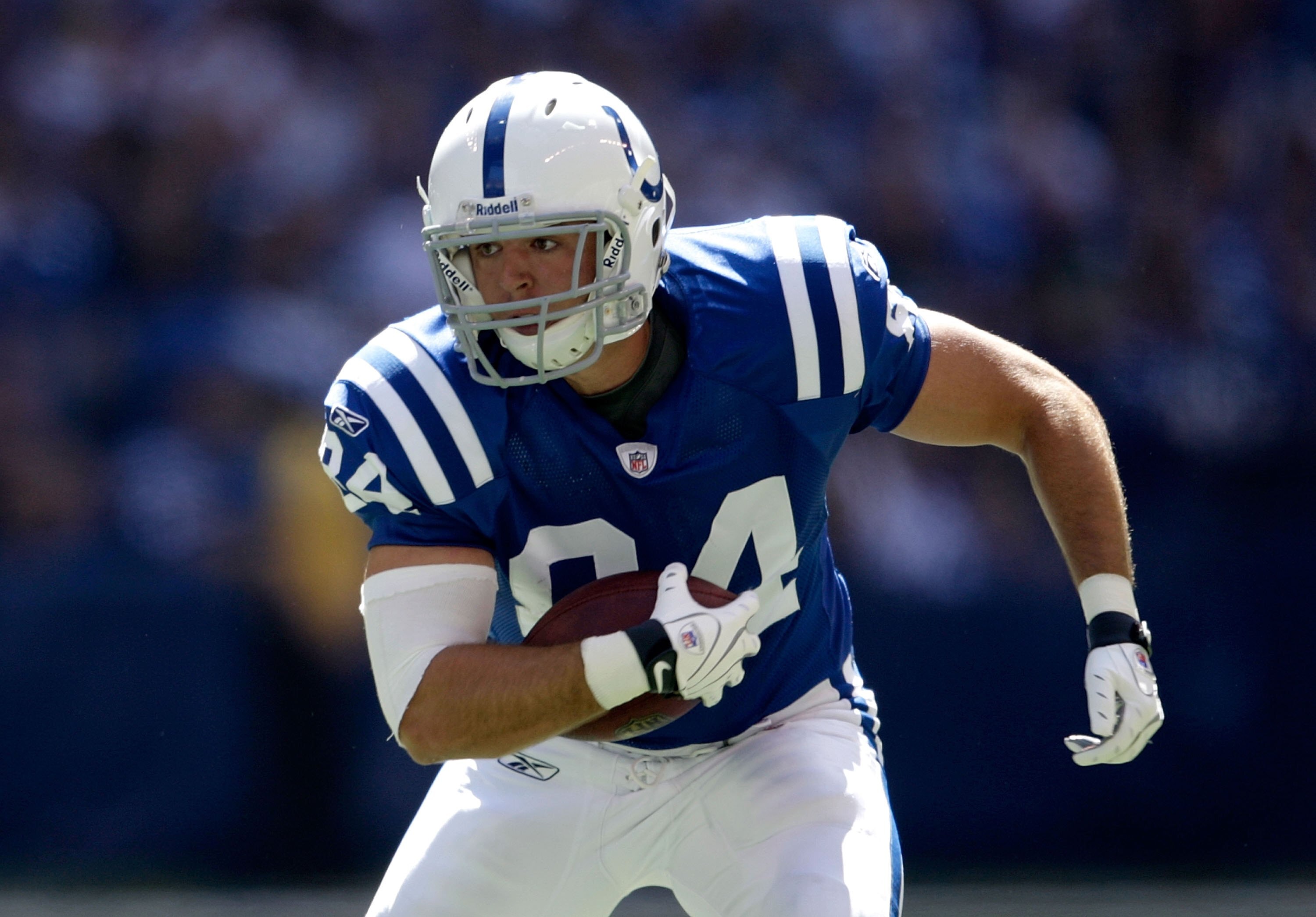 INDIANAPOLIS - SEPTEMBER 13:  Jacob Tamme #84 of the Indianapolis Colts runs with the ball during the game against the Jacksonville Jaguars at Lucas Oil Stadium on September 13, 2009 in Indianapolis, Indiana.  (Photo by Andy Lyons/Getty Images)