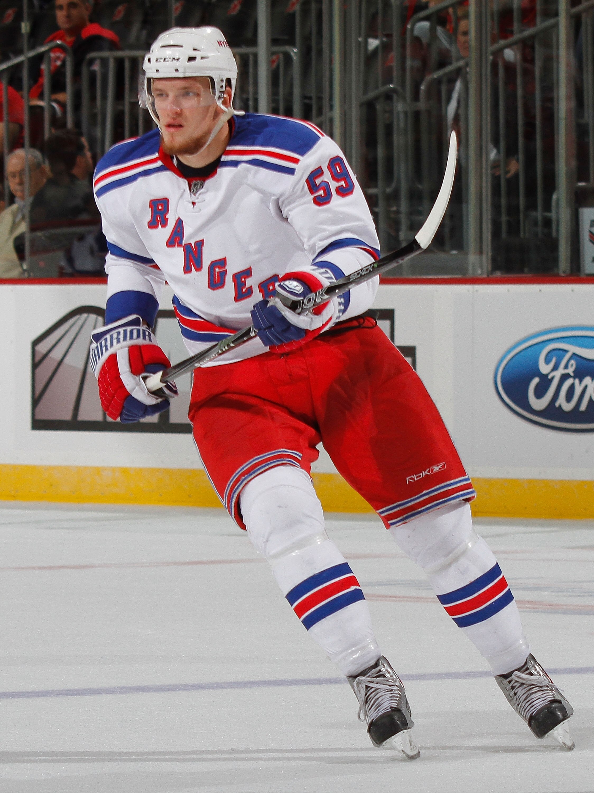 NEWARK, NJ - SEPTEMBER 25:  Evgeny Grachev #59 of the New York Rangers during a preseason game against the New Jersey Devils at the Prudential Center on September 25, 2010 in Newark, New Jersey.  (Photo by Paul Bereswill/Getty Images)
