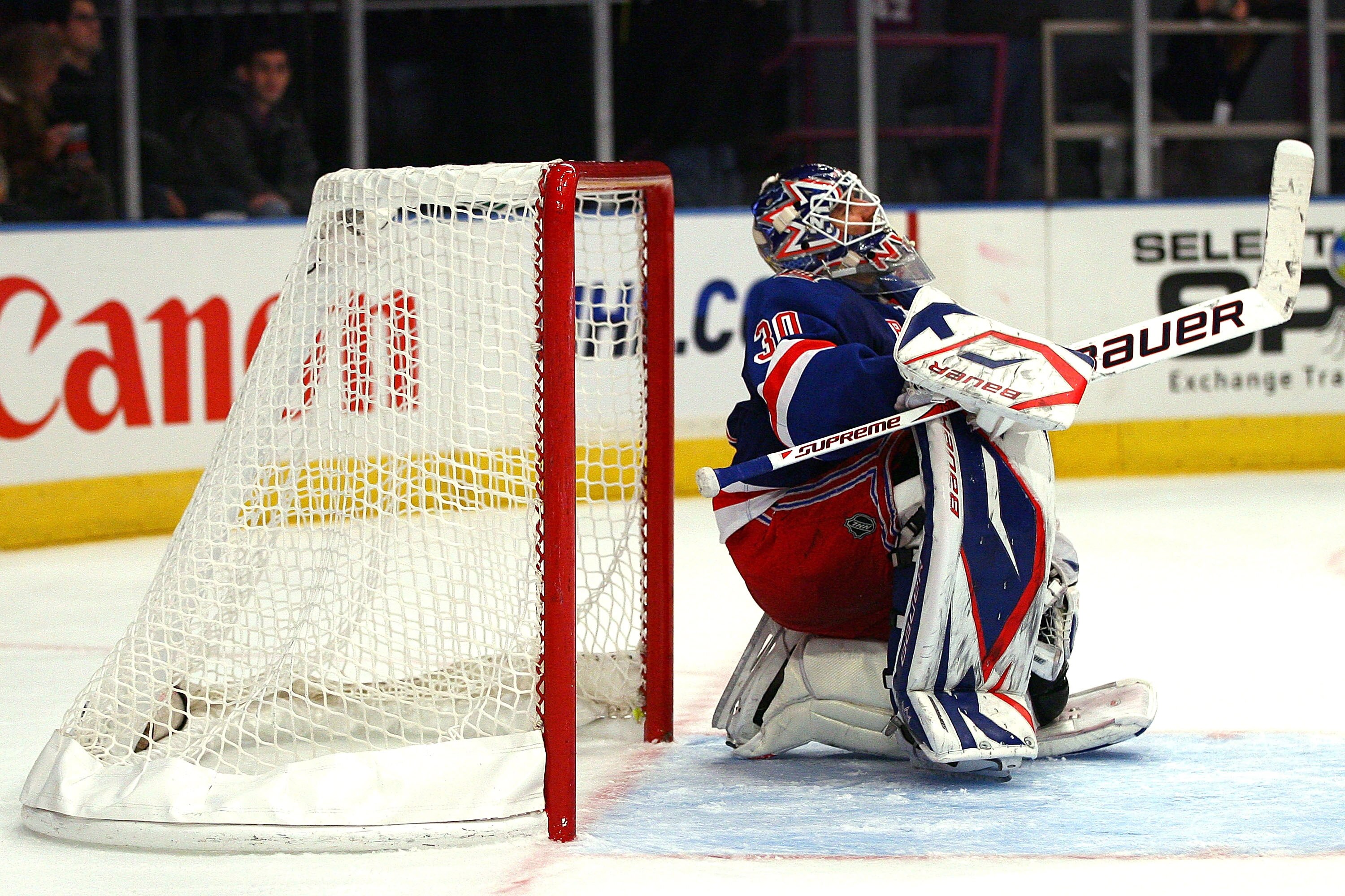 NEW YORK - OCTOBER 29:  Henrik Lundqvist #30 of the New York Rangers sits on the ice after allowing Erik Cole, of the Carolina Hurricanes, to score the game winning goal in the third period on October 29, 2010 at Madison Square Garden in New York City, Ne