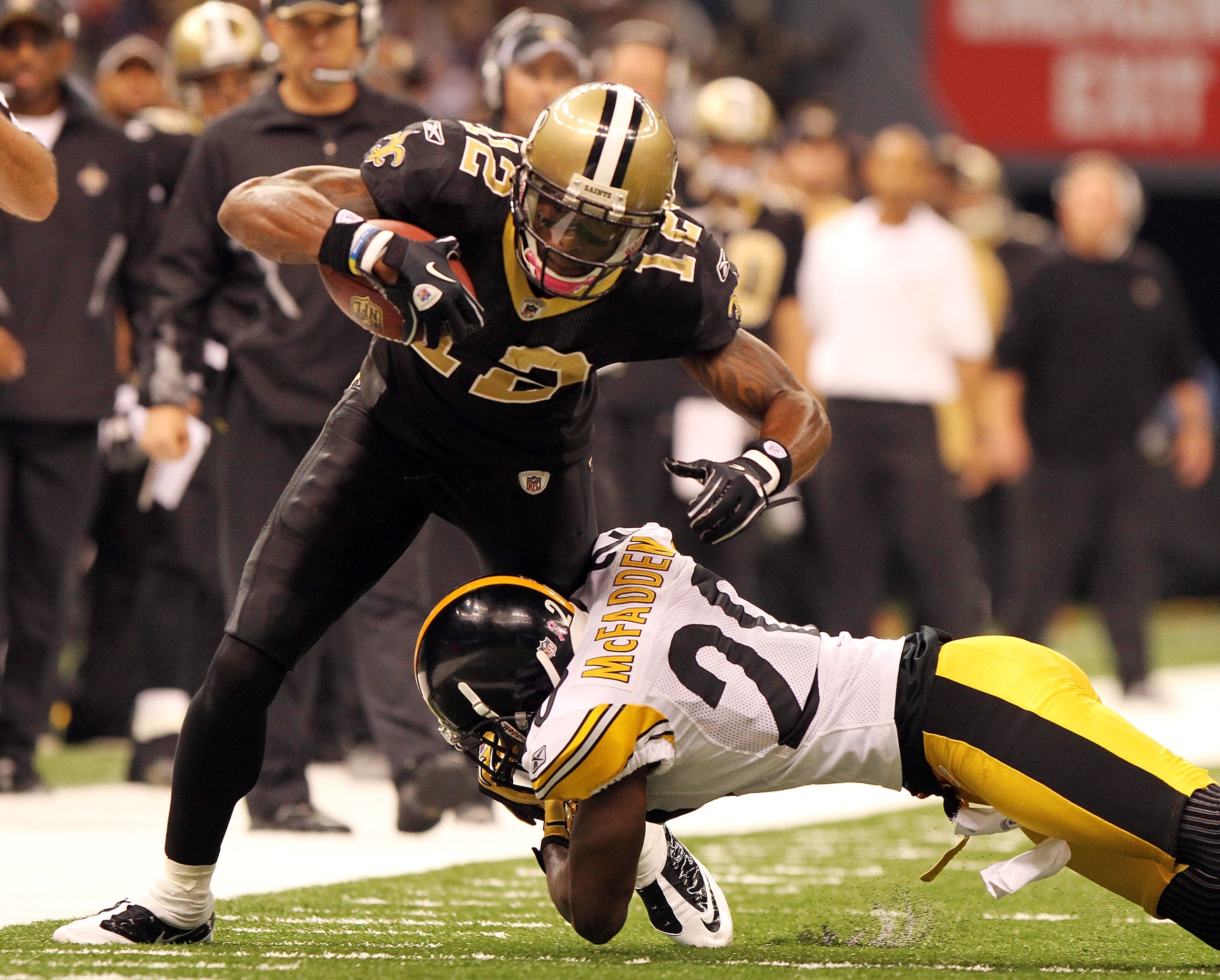 NEW ORLEANS - OCTOBER 31: Marques Colston #12 of the New Orleans Saints is tackled by Bryant McFadden #20 of the Pittsburgh Steelers at the Louisiana Superdome on October 31, 2010 in New Orleans, Louisiana. (Photo by Matthew Sharpe/Getty Images) NEW ORLEANS - OCTOBER 31: Marques Colston #12 of the New Orleans Saints is tackled by Bryant McFadden #20 of the Pittsburgh Steelers at the Louisiana Superdome on October 31, 2010 in New Orleans, Louisiana. (Photo by Matthew Sharpe/Getty Images)
