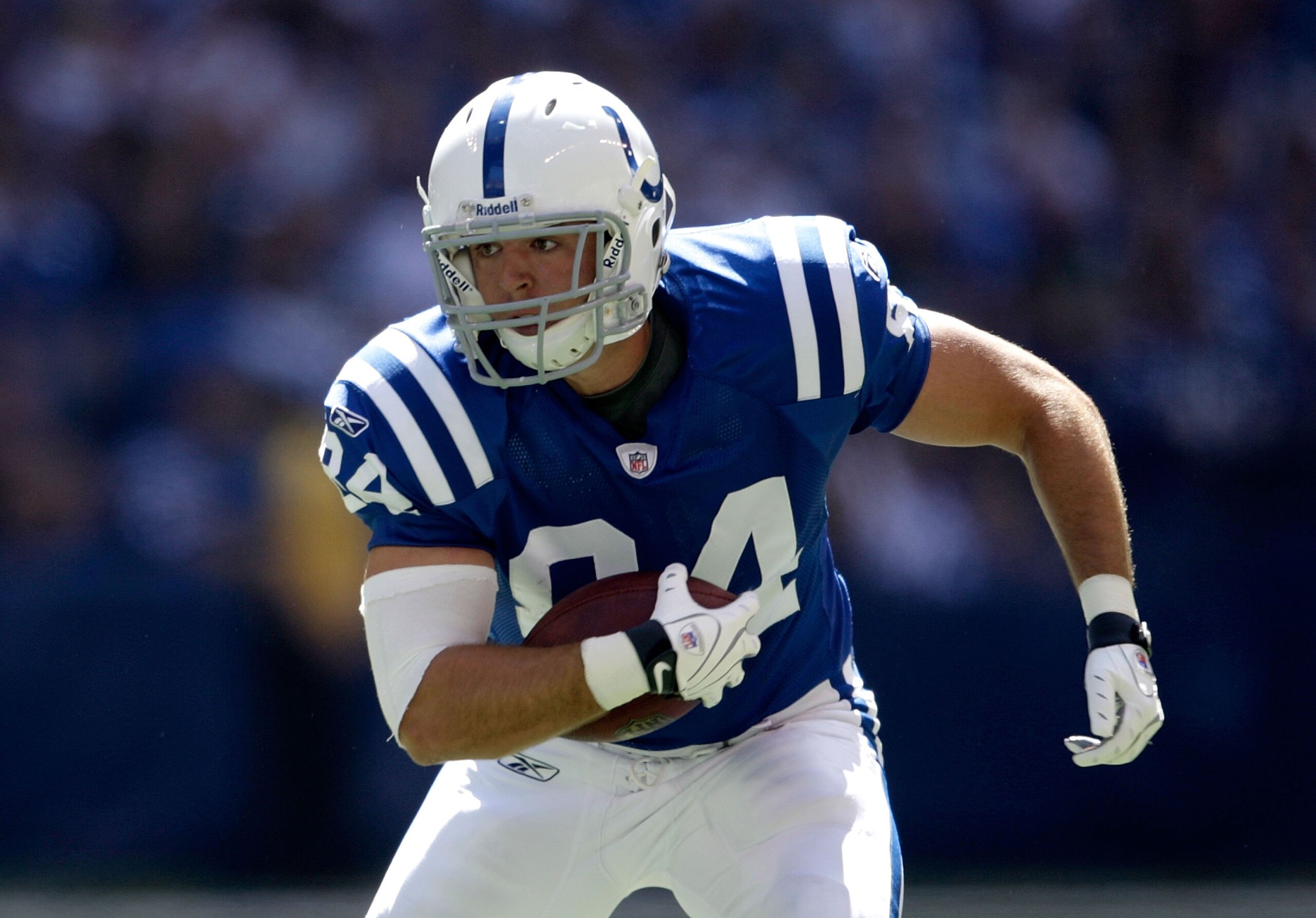 INDIANAPOLIS - SEPTEMBER 13:  Jacob Tamme #84 of the Indianapolis Colts runs with the ball during the game against the Jacksonville Jaguars at Lucas Oil Stadium on September 13, 2009 in Indianapolis, Indiana.  (Photo by Andy Lyons/Getty Images)