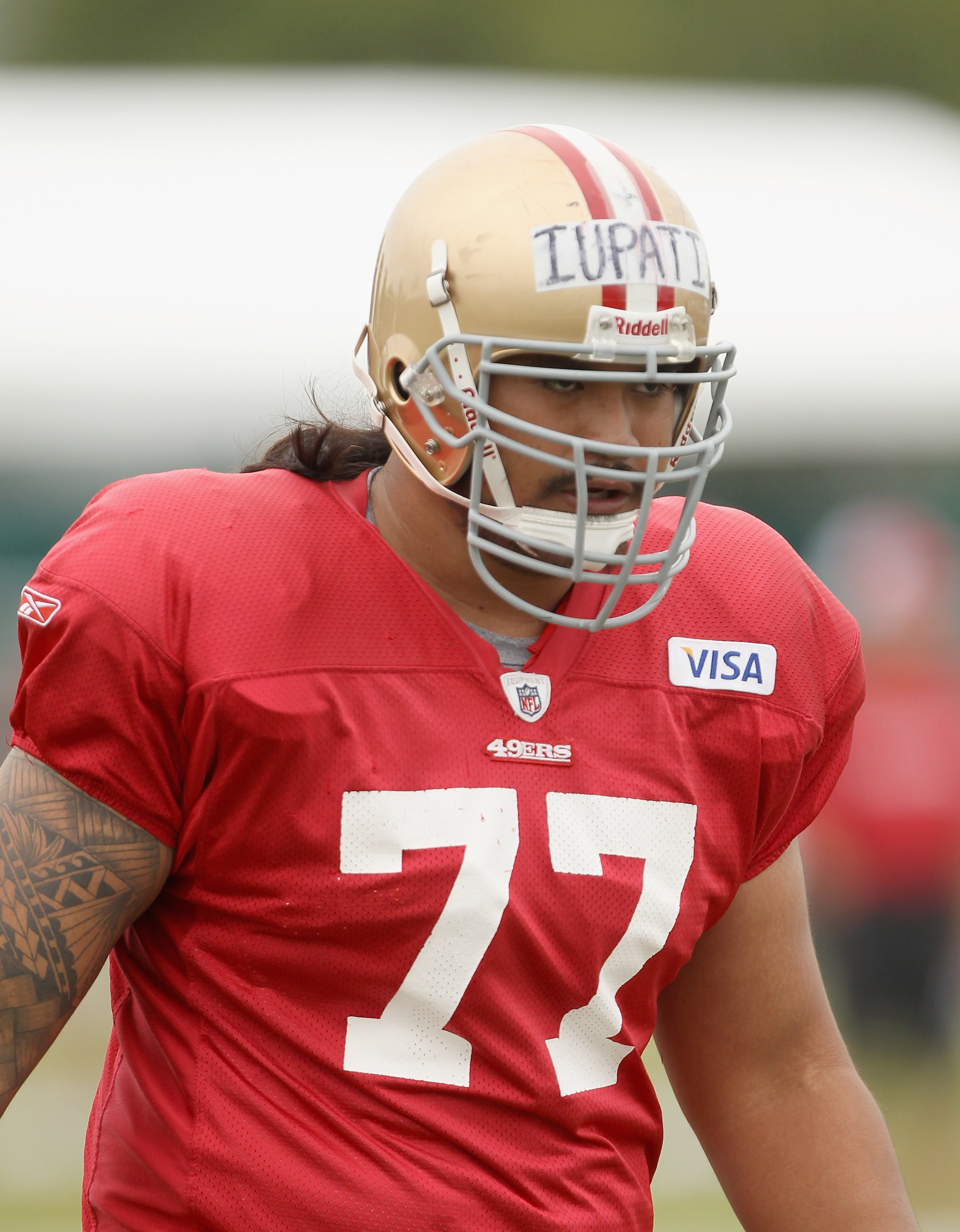 SANTA CLARA, CA - AUGUST 02:  Mike Iupati #77 works out during the San Francisco 49ers training camp at their training complex on August 2, 2010 in Santa Clara, California.  (Photo by Ezra Shaw/Getty Images)