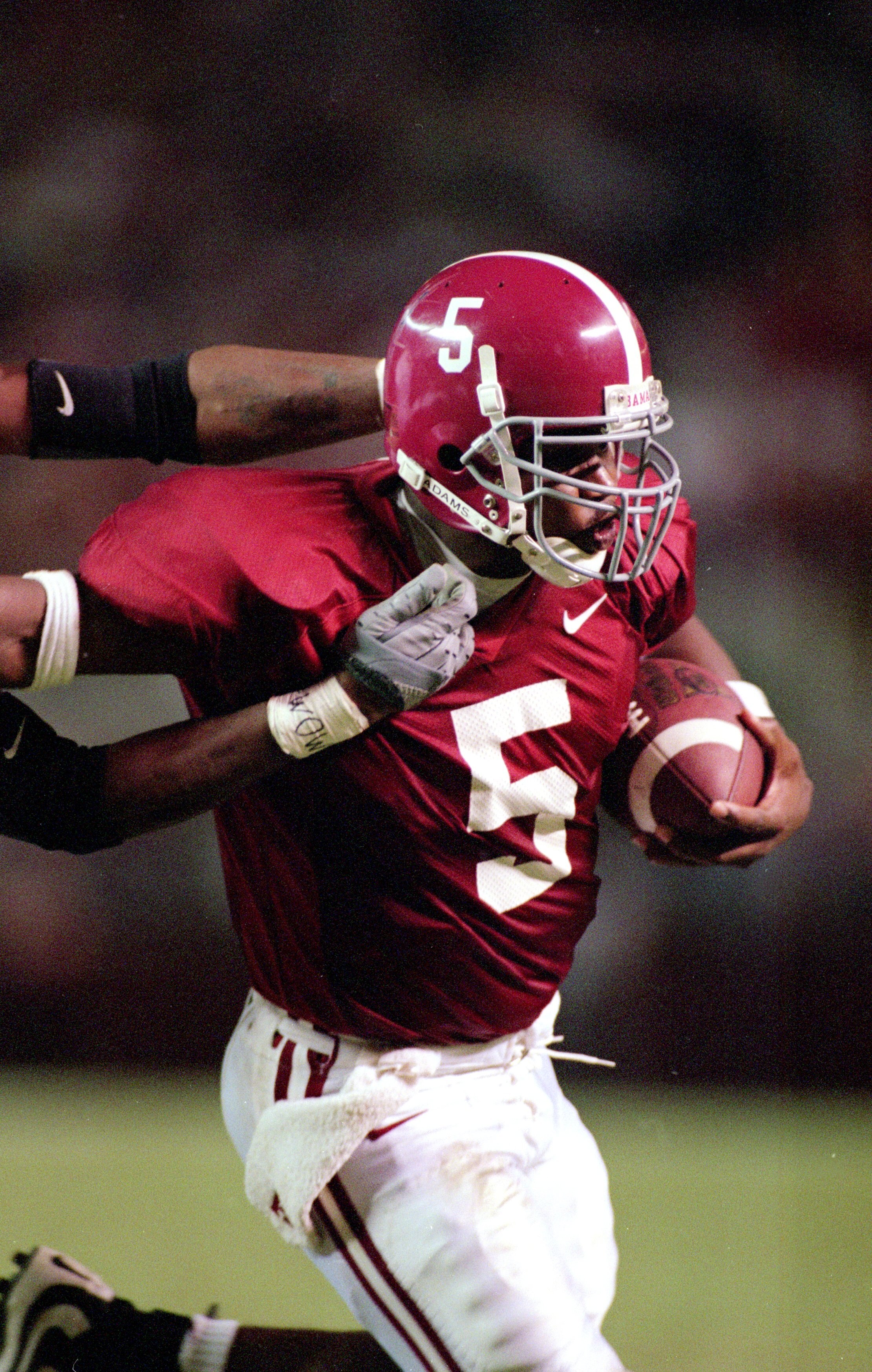 14 Oct 2000: Quarterback Andrew Zow #5 of the Alabama Crimson Tide carries the ball during the game against the Mississippi Rebels at the Bryant-Denny Stadium in Tuscaloosa, Alabama. The Crimson Tide defeated the Rebels 45-7.Mandatory Credit: Blake Sims