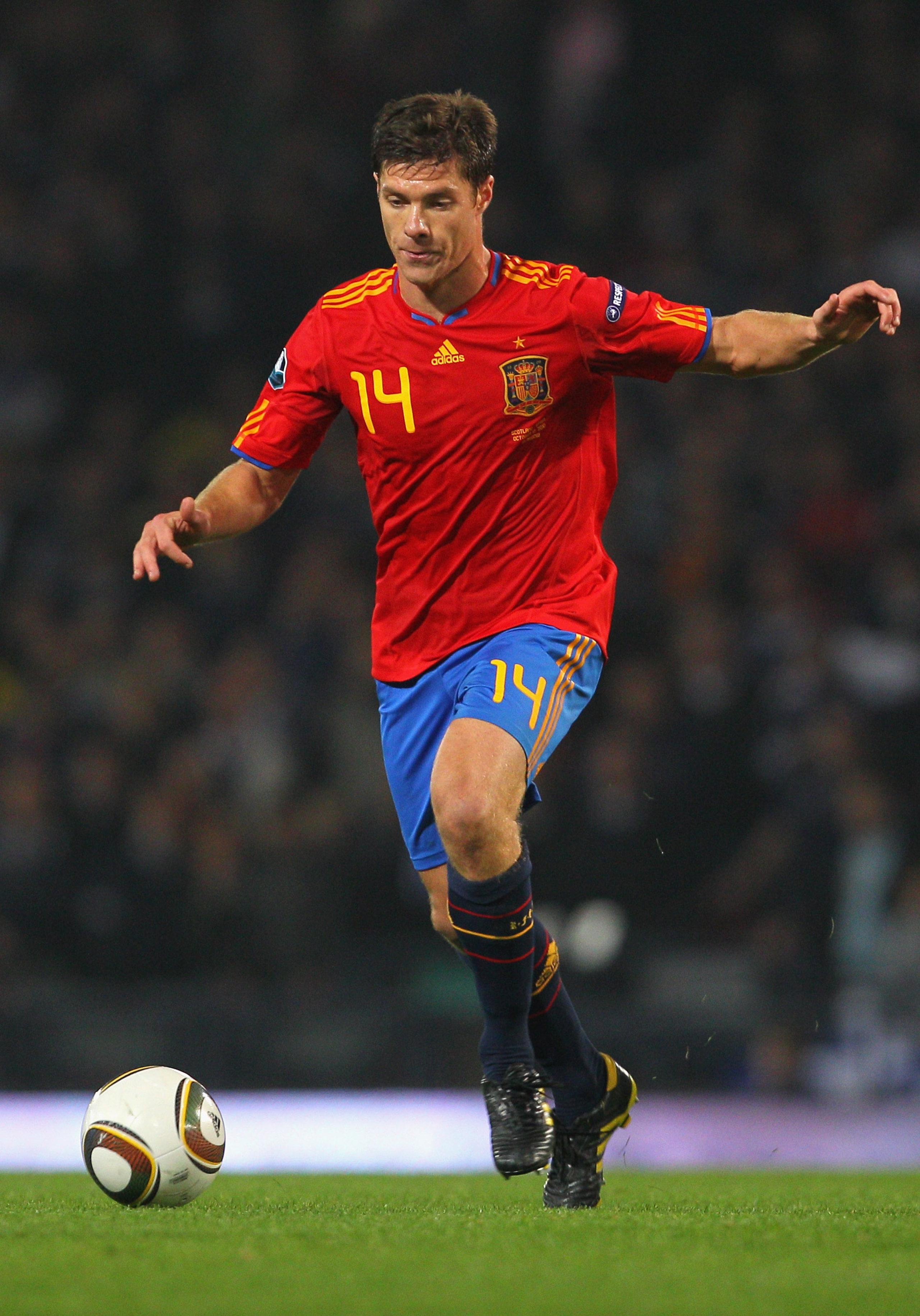 GLASGOW, SCOTLAND - OCTOBER 12: Xabier Alonso of Spain during the UEFA EURO 2012 Group I qualifying match between Scotland and Spain at Hampden Park on October 12, 2010 in Glasgow, Scotland.  (Photo by Clive Rose/Getty Images)
