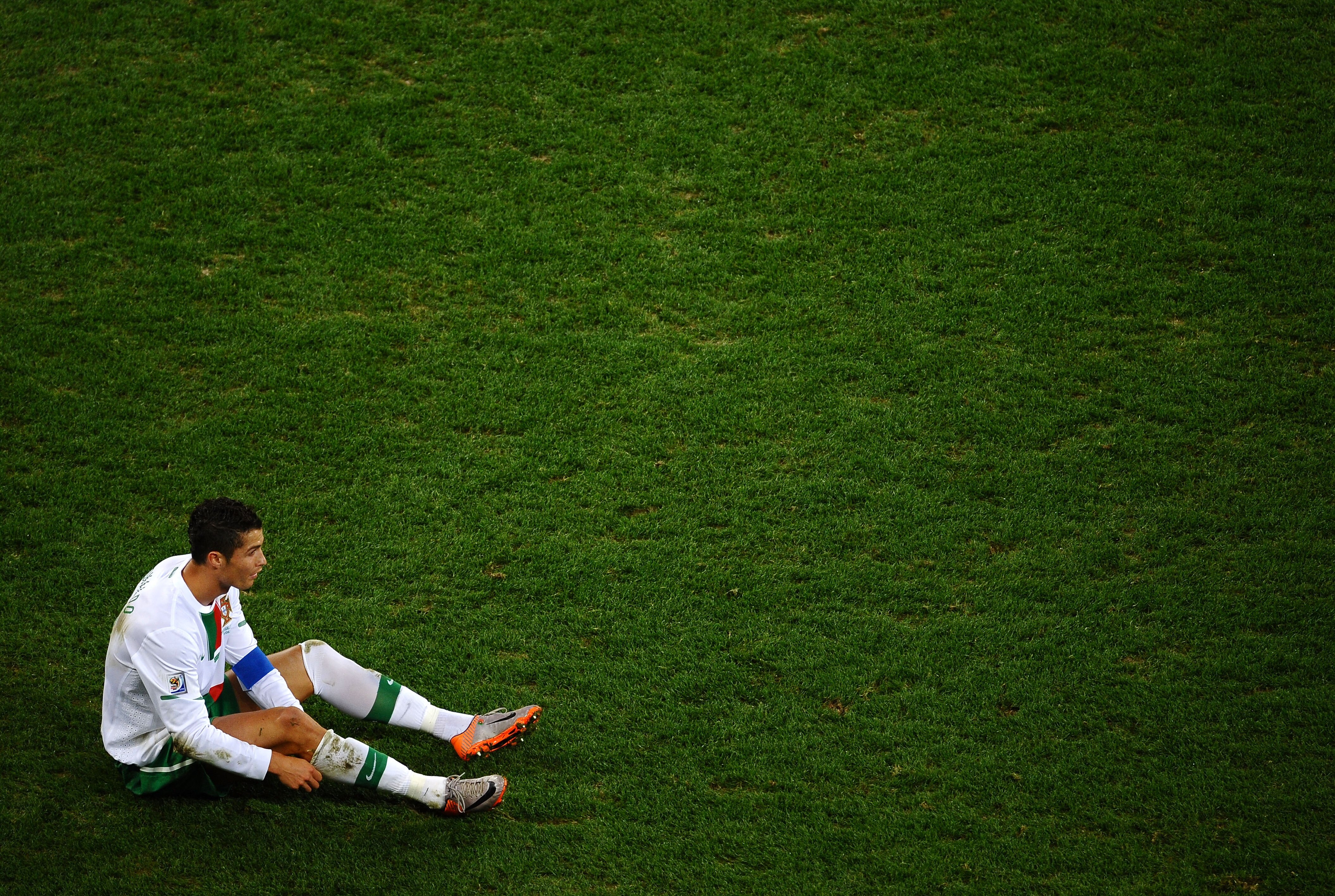 CAPE TOWN, SOUTH AFRICA - JUNE 29:  Dejected Cristiano Ronaldo of Portugal after his side is knocked out of the tournament during the 2010 FIFA World Cup South Africa Round of Sixteen match between Spain and Portugal at Green Point Stadium on June 29, 201