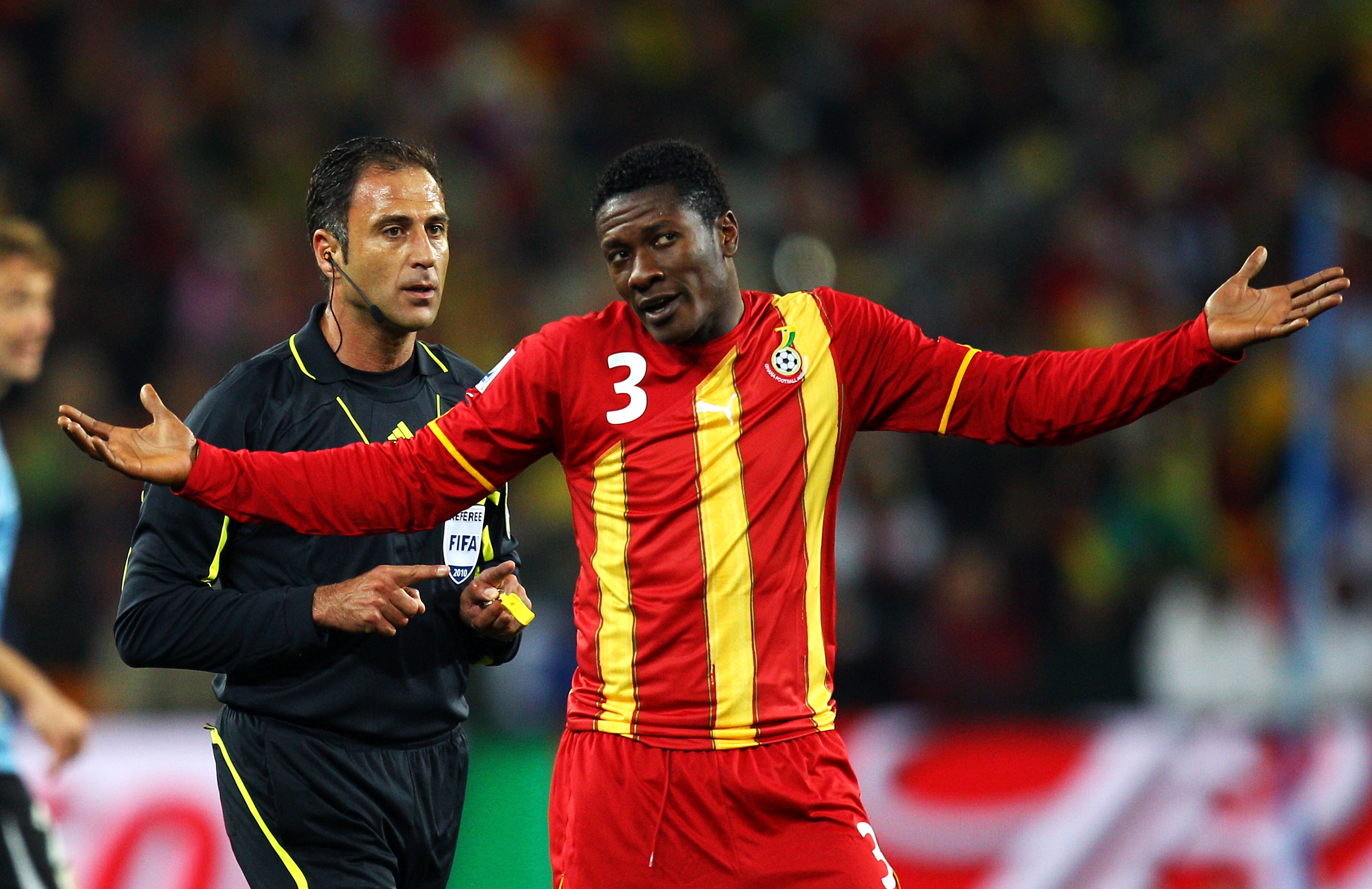 JOHANNESBURG, SOUTH AFRICA - JULY 02: Asamoah Gyan of Ghana gestures during the 2010 FIFA World Cup South Africa Quarter Final match between Uruguay and Ghana at the Soccer City stadium on July 2, 2010 in Johannesburg, South Africa.  (Photo by Cameron Spe