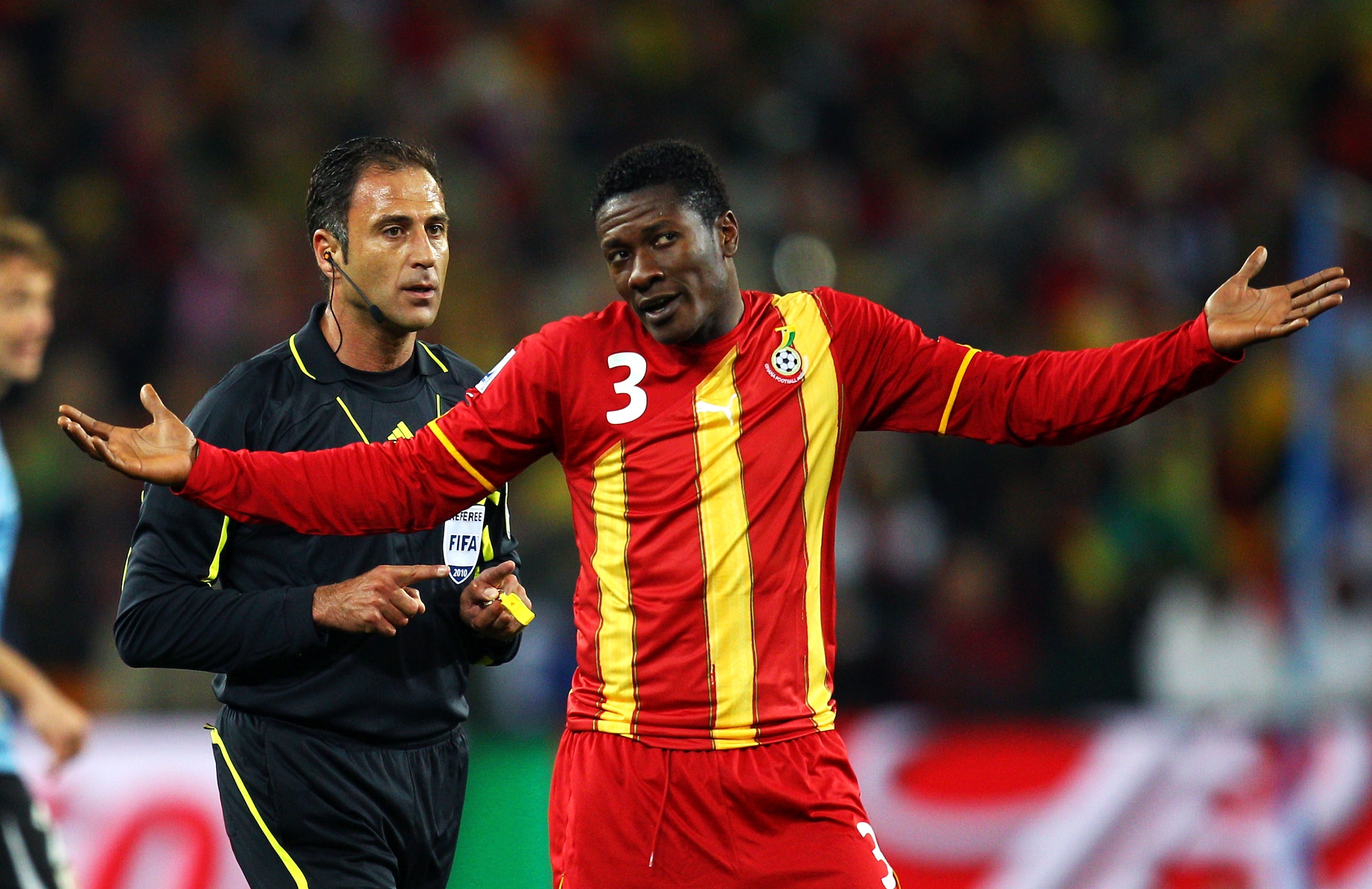 JOHANNESBURG, SOUTH AFRICA - JULY 02: Asamoah Gyan of Ghana gestures during the 2010 FIFA World Cup South Africa Quarter Final match between Uruguay and Ghana at the Soccer City stadium on July 2, 2010 in Johannesburg, South Africa.  (Photo by Cameron Spe