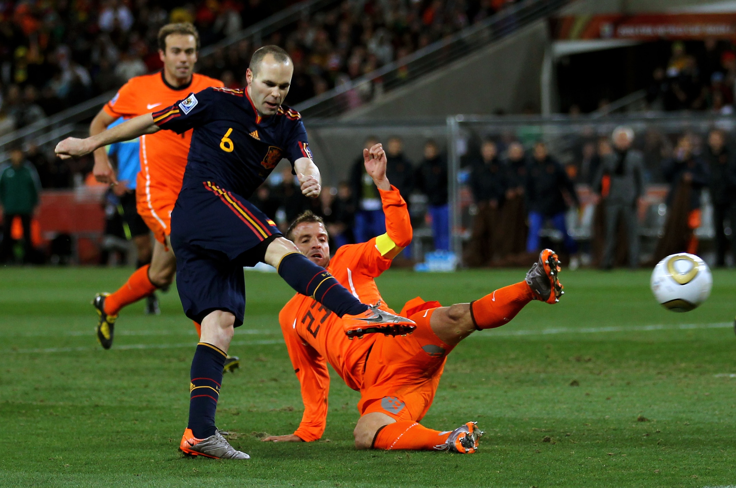 JOHANNESBURG, SOUTH AFRICA - JULY 11:  Andres Iniesta of Spain scores his side's first goal during the 2010 FIFA World Cup South Africa Final match between Netherlands and Spain at Soccer City Stadium on July 11, 2010 in Johannesburg, South Africa.  (Phot