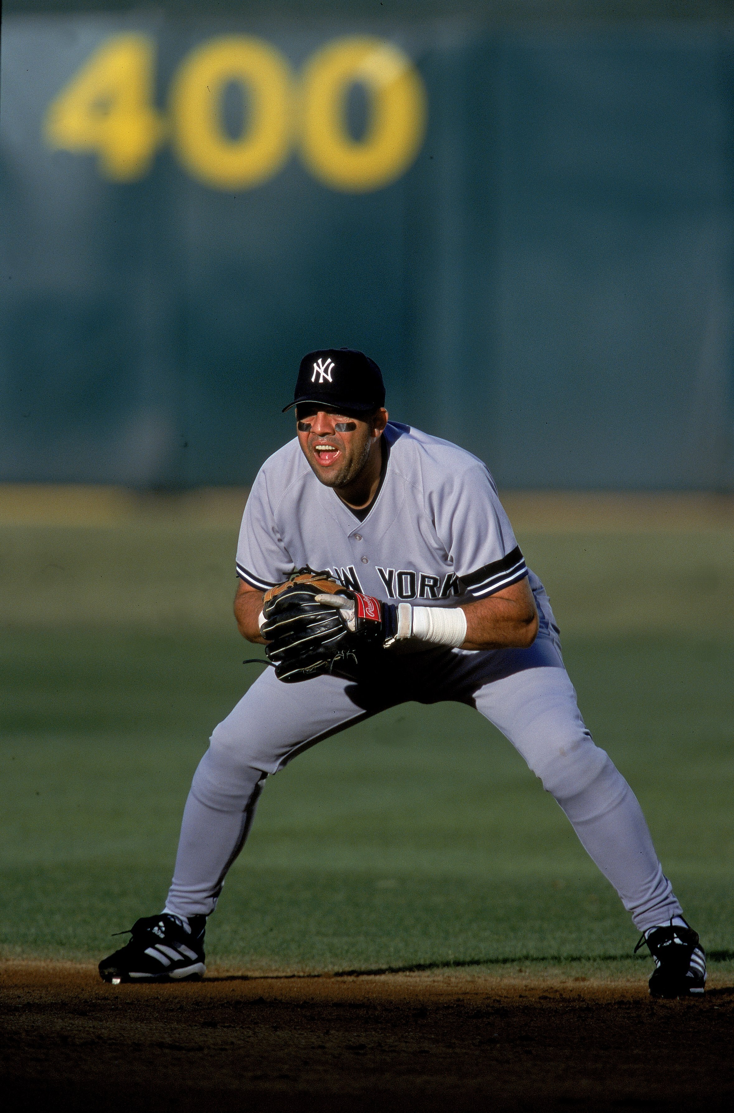 3 Oct 2000:  Luis Sojo #14 of the New York Yankees waits for the pitch during the game against the Oakland Athletics at the Network Associates Coliseum in Oakland, California. The Athletics defeated the Yankees 5-3.Mandatory Credit: Tom Hauck  /Allsport