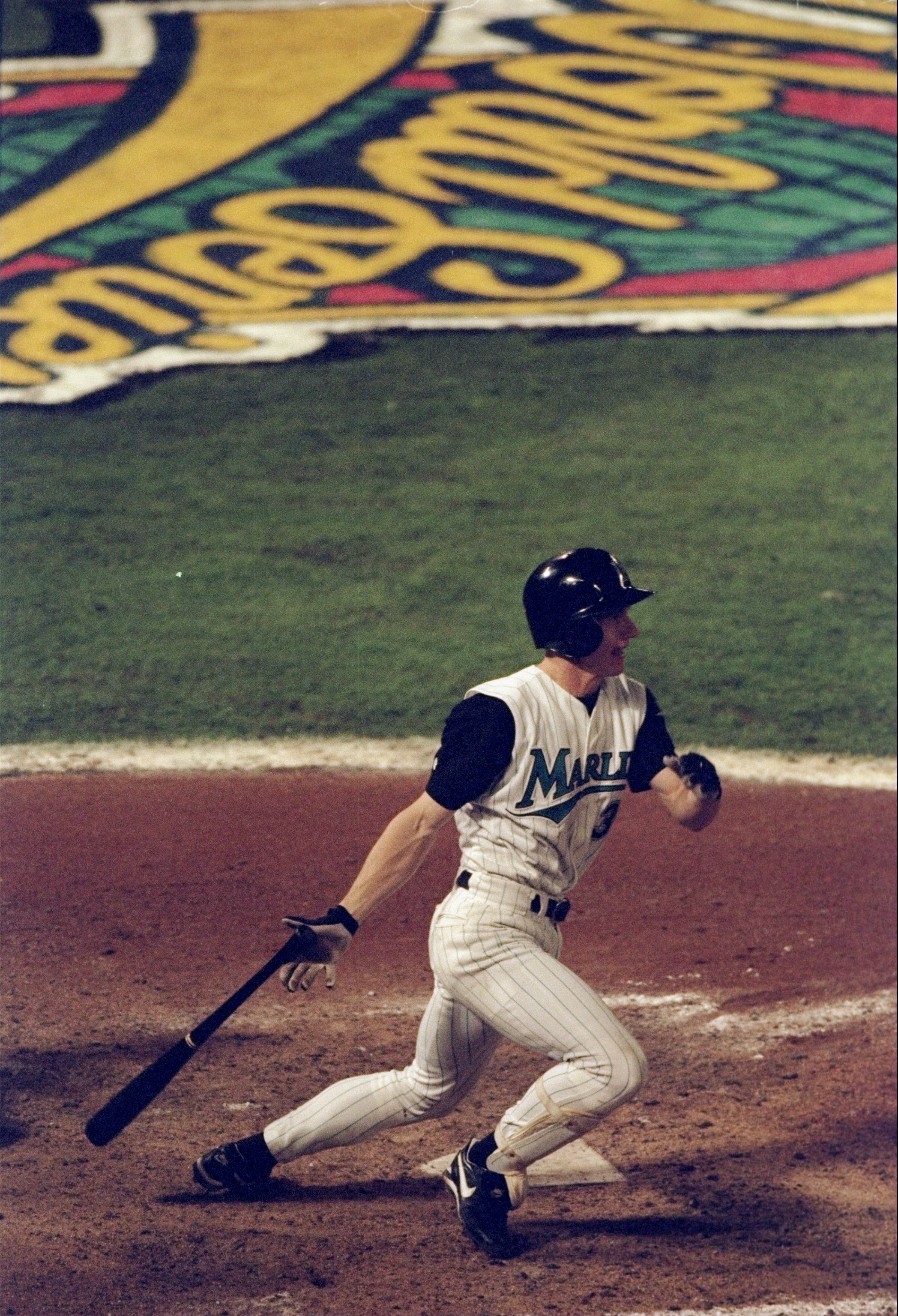26 Oct 1997:  Pitcher Craig Counsell of the Florida Marlins hits a sacrafice fly to allow outfielder Moises Alou to score during the seventh game of the World Series against the Cleveland Indians at Pro Player Stadium in Miami, Florida.  The Marlins won t