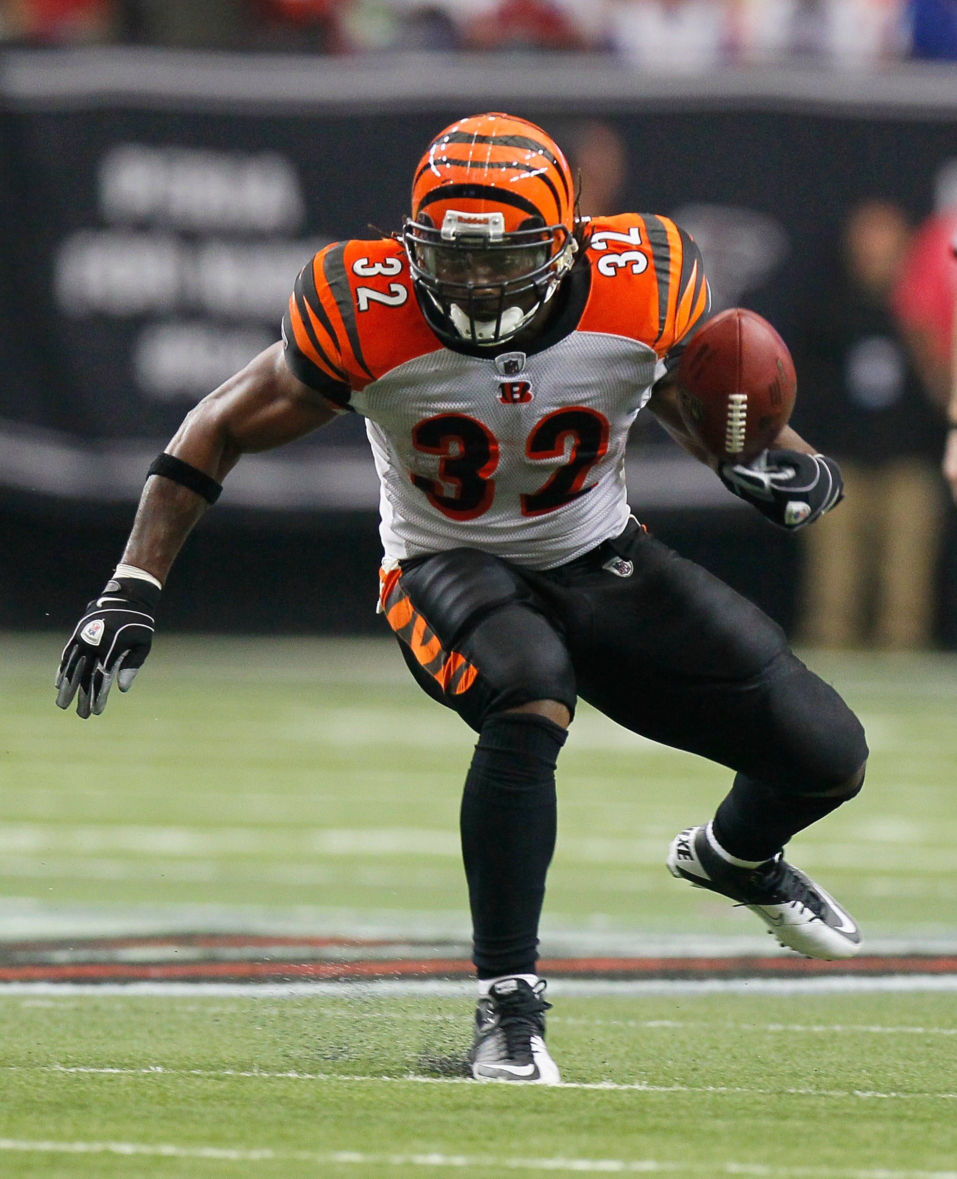 ATLANTA - OCTOBER 24:  Cedric Benson #32 of the Cincinnati Bengals fumbles the ball against the Atlanta Falcons at Georgia Dome on October 24, 2010 in Atlanta, Georgia.  (Photo by Kevin C. Cox/Getty Images)