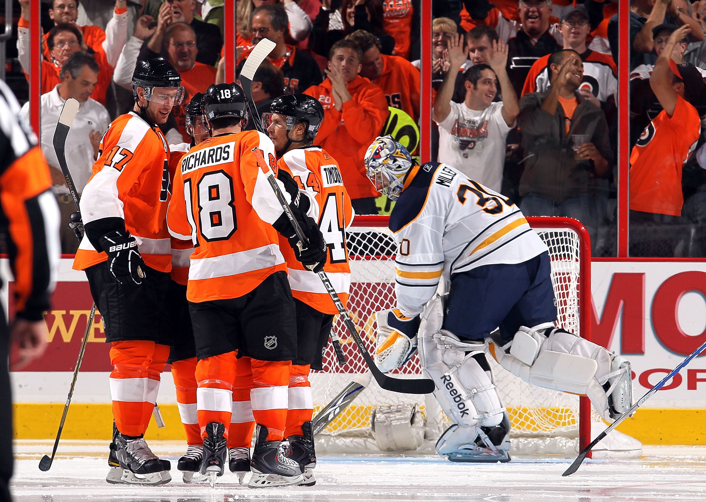 PHILADELPHIA - OCTOBER 26:  Jeff Carter #17 of the Philadelphia Flyers celebrates his third period goal past Ryan Miller #30 of the Buffalo Sabres with his teammates on October 26, 2010 at Wells Fargo Center in Philadelphia, Pennsylvania. The Flyers defea