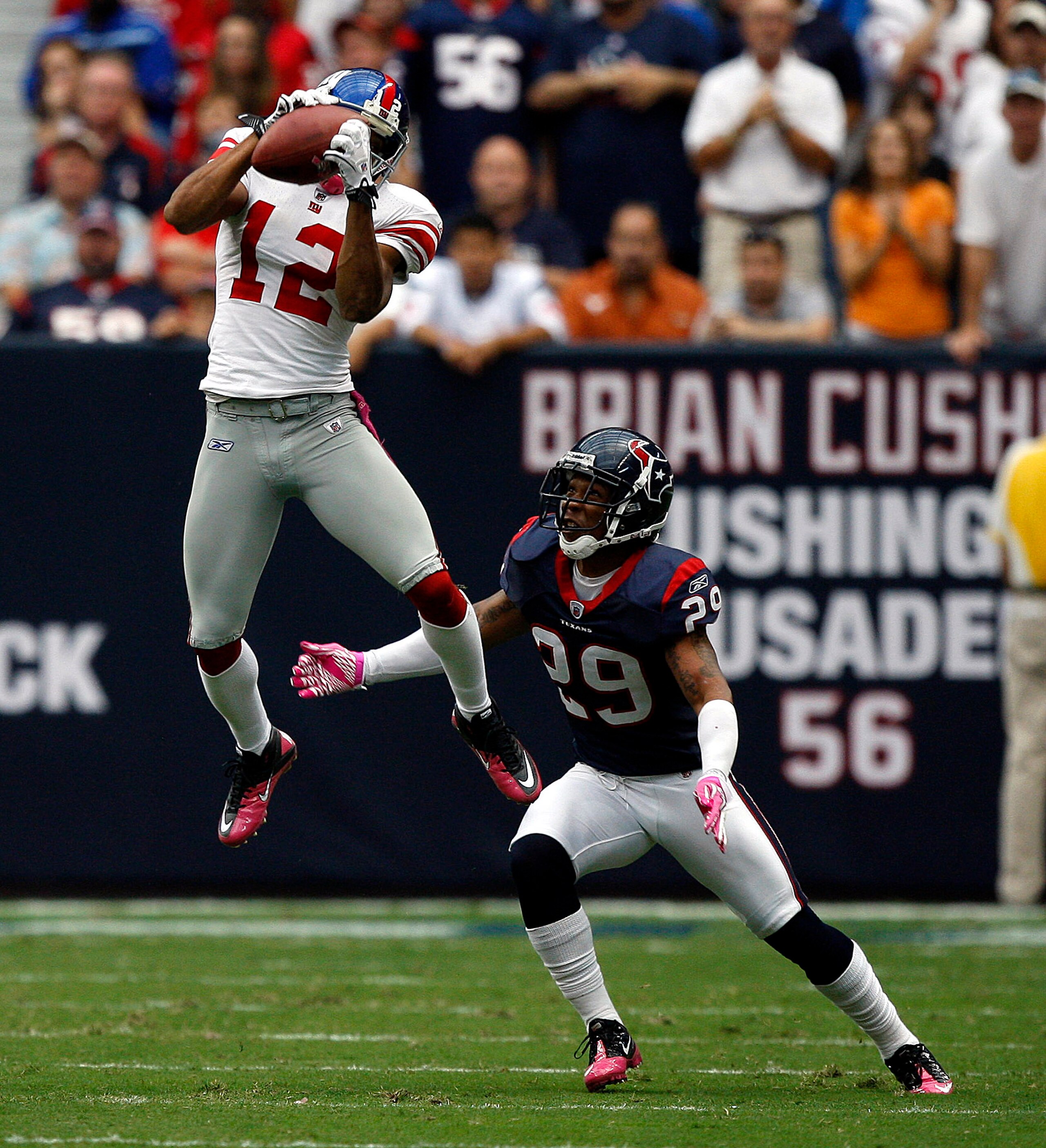 HOUSTON - OCTOBER 10: Wide receiver Steve Smith #12 of the New York Giants goes up high in front of cornerback Glover Quin #29 of the Houston Texans in the first half at Reliant Stadium on October 10, 2010 in Houston, Texas. (Photo by Bob Levey/Getty Im HOUSTON - OCTOBER 10: Wide receiver Steve Smith #12 of the New York Giants goes up high in front of cornerback Glover Quin #29 of the Houston Texans in the first half at Reliant Stadium on October 10, 2010 in Houston, Texas. (Photo by Bob Levey/Getty Im