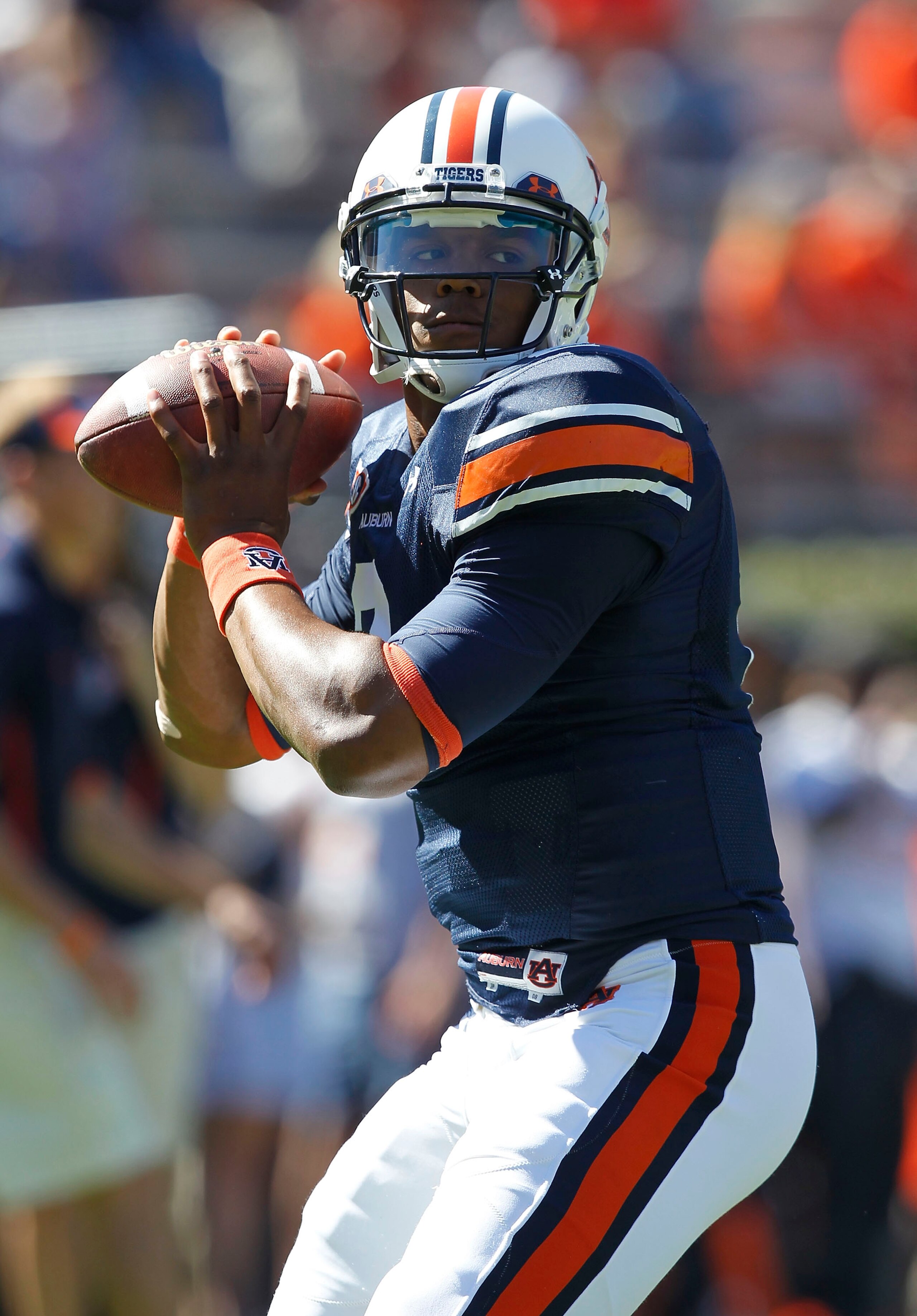 AUBURN, AL - OCTOBER 16: Quarterback Cam Newton #2 of the Auburn Tigers throws a practice pass before the game against the Arkansas Razorbacks at Jordan-Hare Stadium on October 16, 2010 in Auburn, Alabama. (Photo by Mike Zarrilli/Getty Images) AUBURN, AL - OCTOBER 16: Quarterback Cam Newton #2 of the Auburn Tigers throws a practice pass before the game against the Arkansas Razorbacks at Jordan-Hare Stadium on October 16, 2010 in Auburn, Alabama. (Photo by Mike Zarrilli/Getty Images)