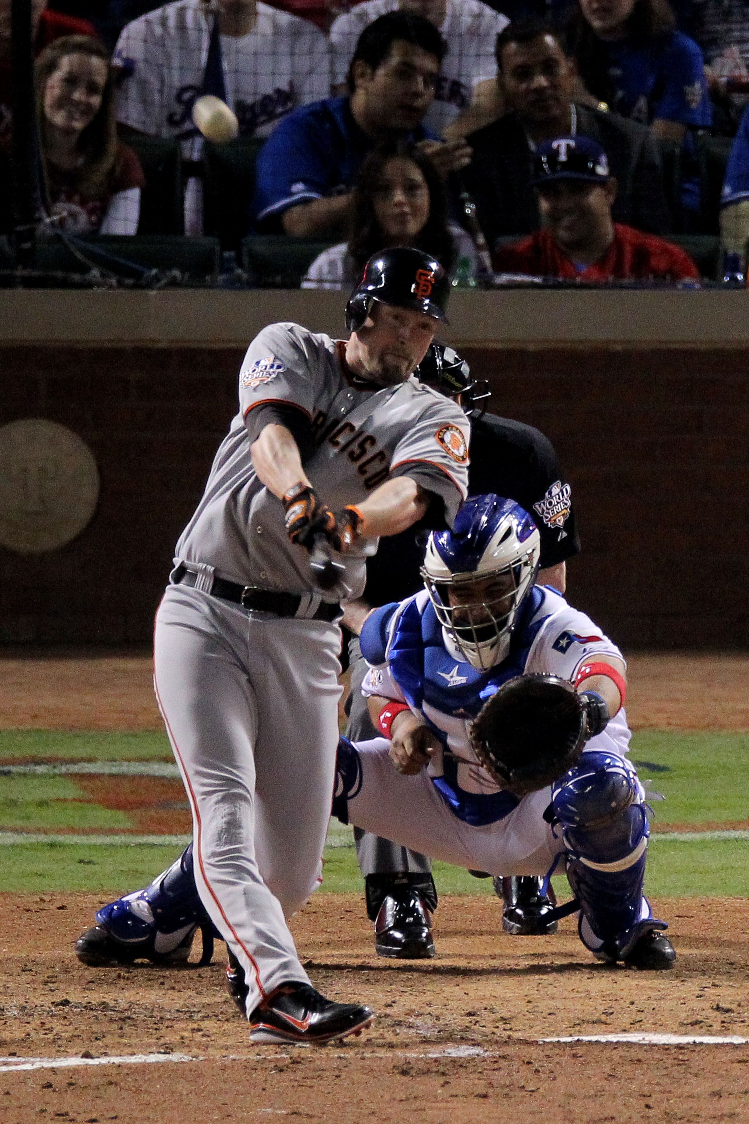 ARLINGTON, TX - OCTOBER 31:  Aubrey Huff #17 of the San Francisco Giants hits a 2-run home run against the Texas Rangers in the top of the third inning of Game Four of the 2010 MLB World Series at Rangers Ballpark in Arlington on October 31, 2010 in Arlin