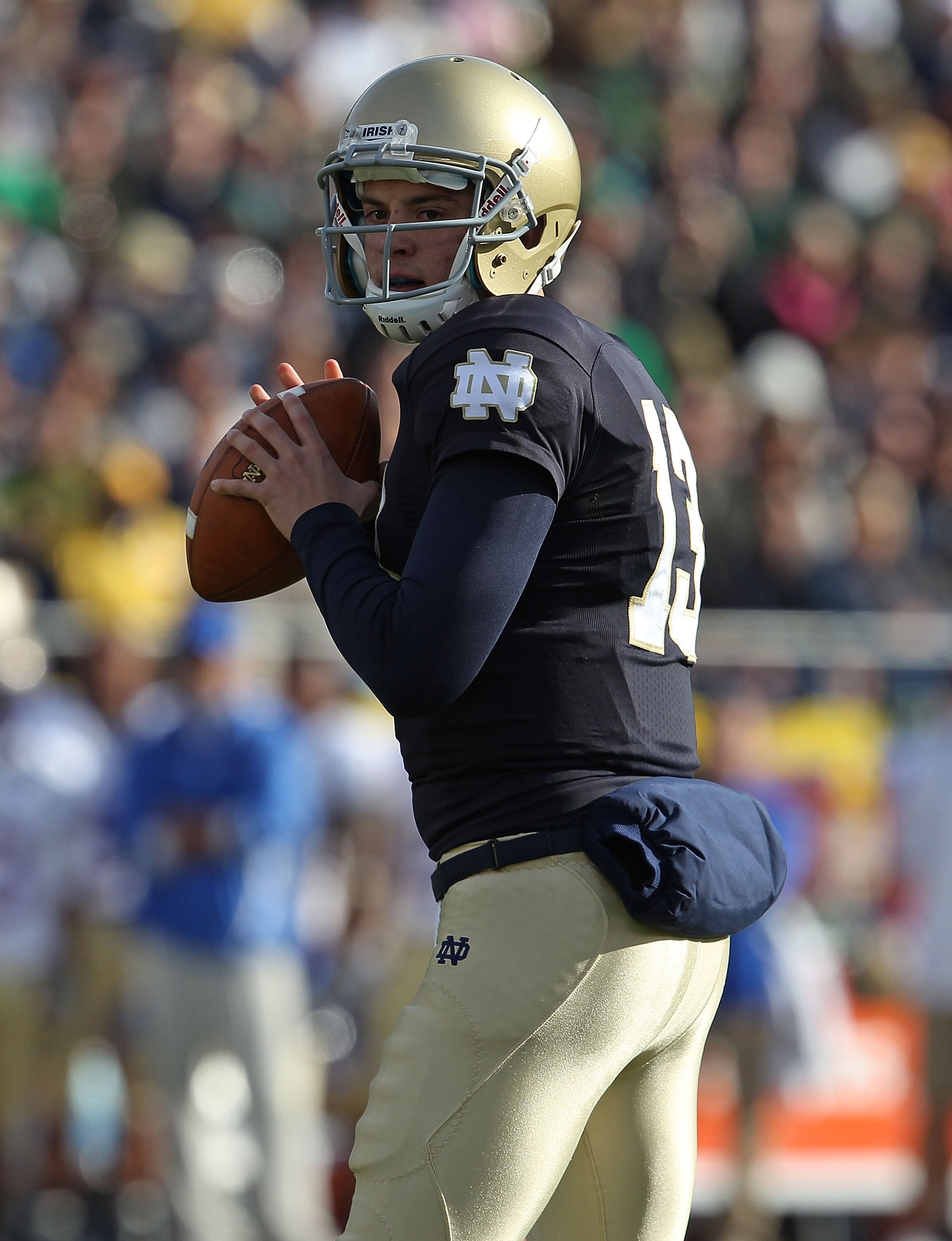 SOUTH BEND, IN - OCTOBER 30: Tommy Rees #13 of the Notre Dame Fighting Irish looks for a receiver against the Tulsa Golden Hurricane at Notre Dame Stadium on October 30, 2010 in South Bend, Indiana. (Photo by Jonathan Daniel/Getty Images)