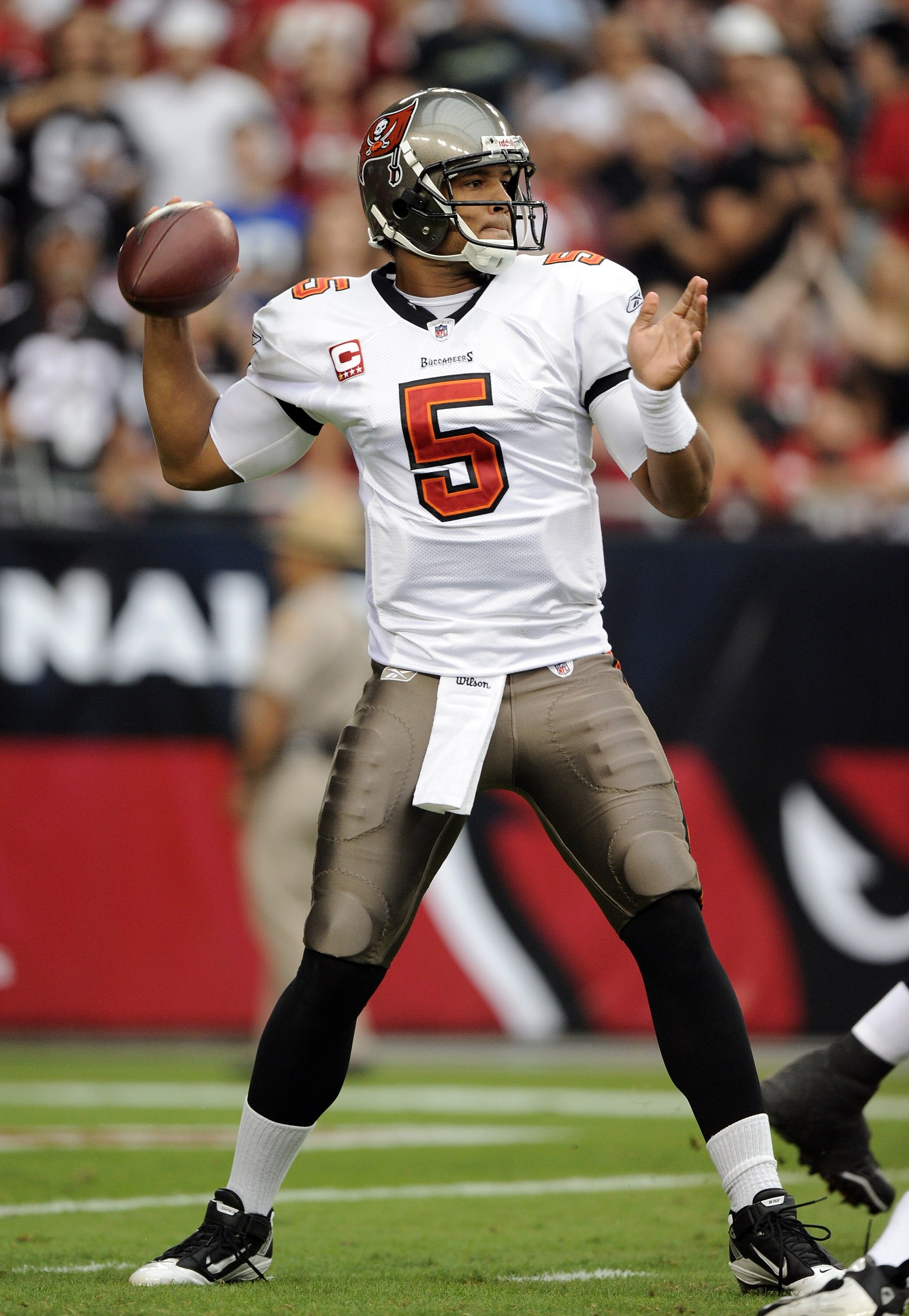GLENDALE, AZ - OCTOBER 31:  Josh Freeman #5 of the Tampa Bay Buccaneers passes in the pocket against the Arizona Cardinals during the first quarter at University of Phoenix Stadium on October 31, 2010 in Glendale, Arizona.  (Photo by Harry How/Getty Image