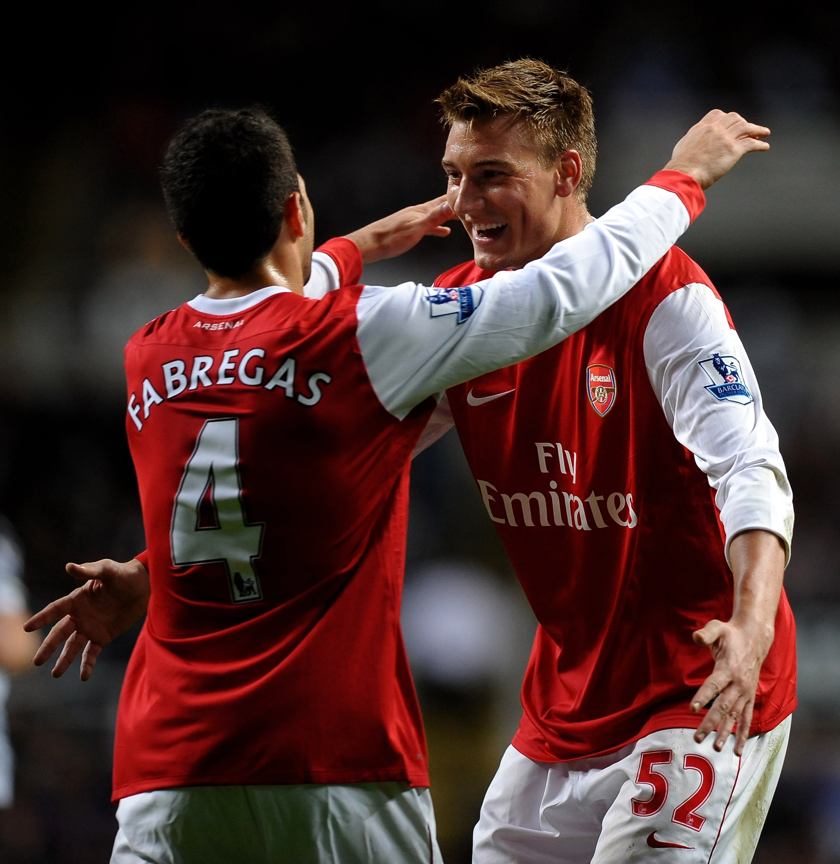 NEWCASTLE UPON TYNE, ENGLAND - OCTOBER 27:  Nicklas Bendtner of Arsenal celebrates scoring his team's third goal with team mate Cesc Fabregas during the Carling Cup Fourth Round match between Newcastle United and Arsenal at St James' Park on October 27, 2